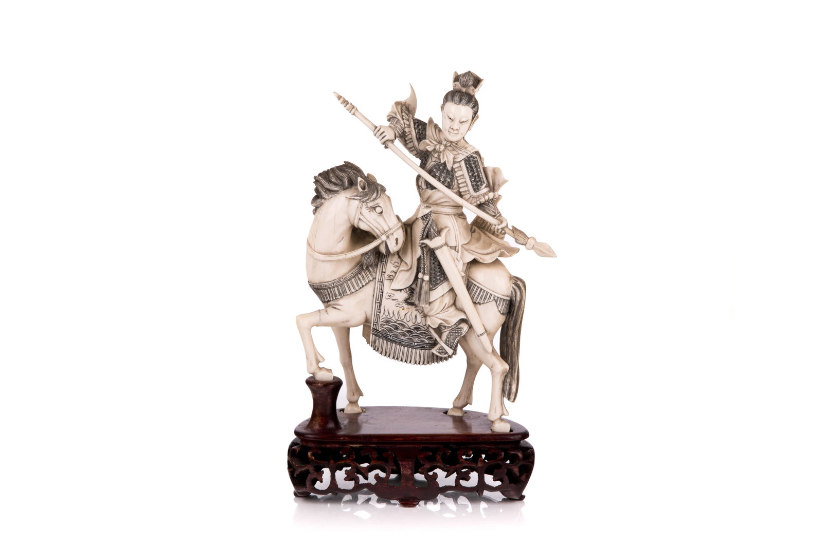 JAPANESE OKIMONO OF A CALVARY: Carved as an equestrian holding multiple weapons. On carved wood stand. H. overall 25.5 cm