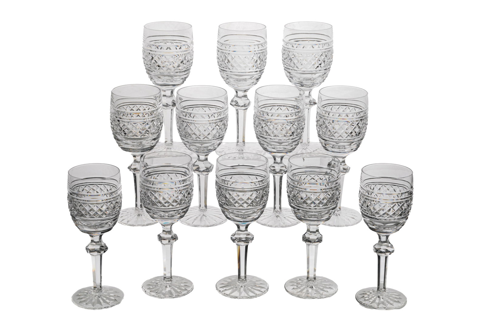 TWELVE WATERFORD 'CASTLETOWN' CLARET WINE GLASSES: Set of twelve Waterford claret wine glasses in the 'Castletown' pattern. All marked for Waterford to the underside. Irish, 20th C.H.: 18 cm (7 1/8 in.)