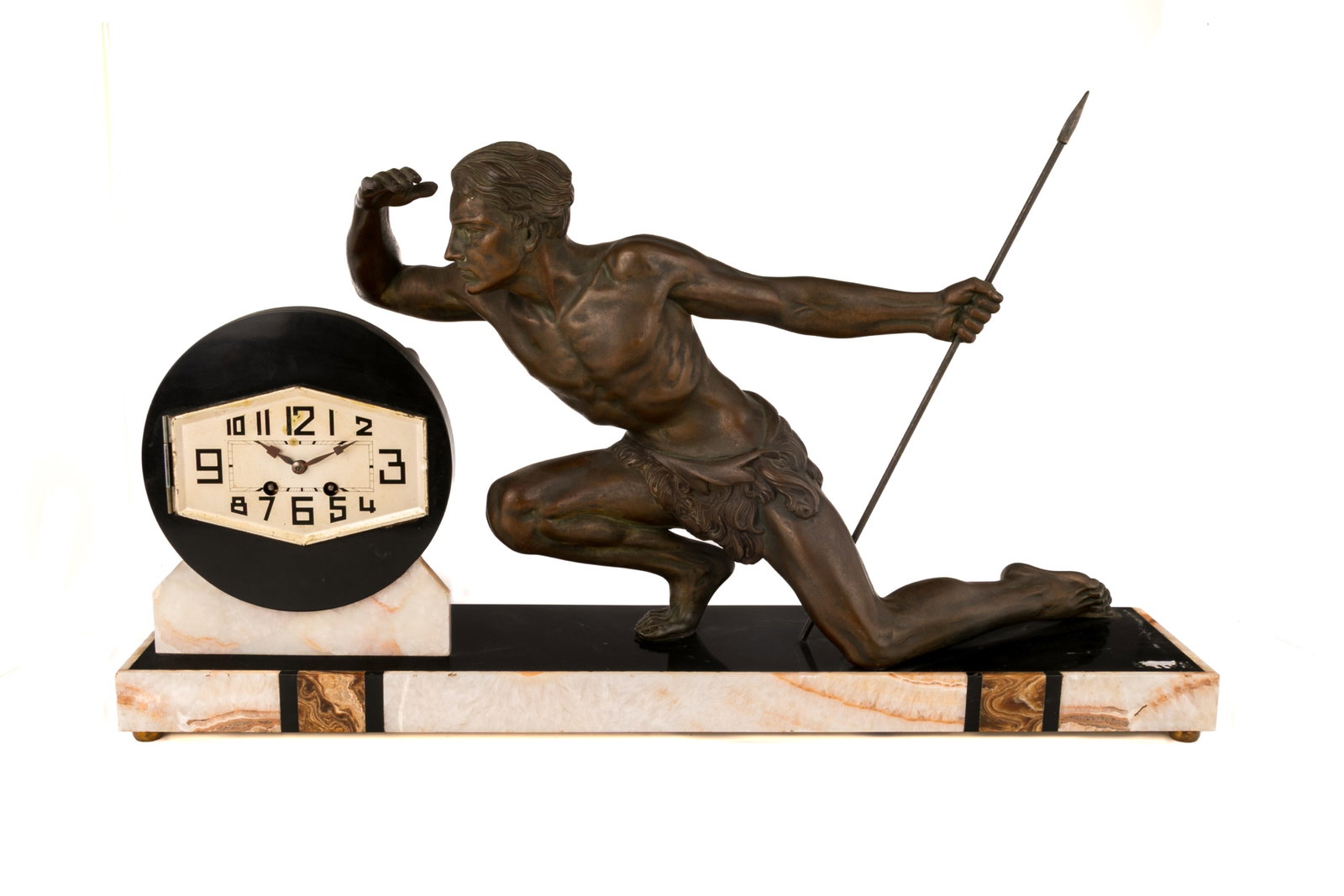 FRENCH ART DECO FIGURAL CLOCK: Patinated metal nude male figure looking at a clock. On pink stone base. L 70cm (27.5in)