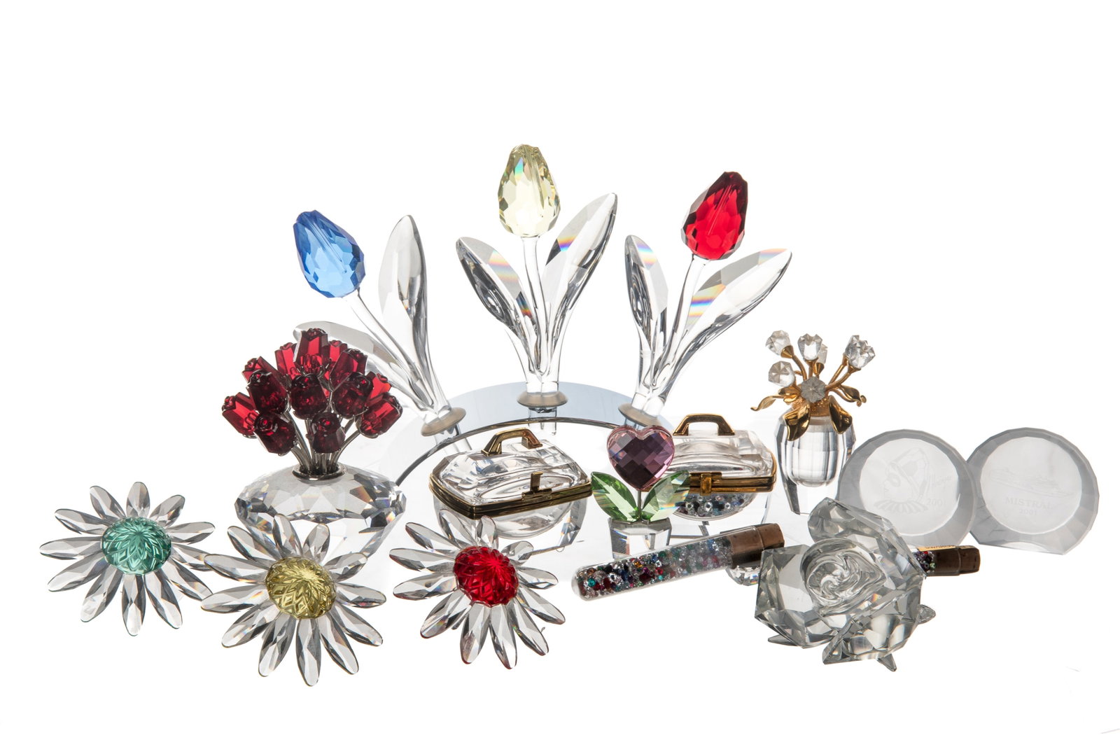 GROUP OF SWAROVSKI CRYSTAL FLOWERS: In mixed colours.