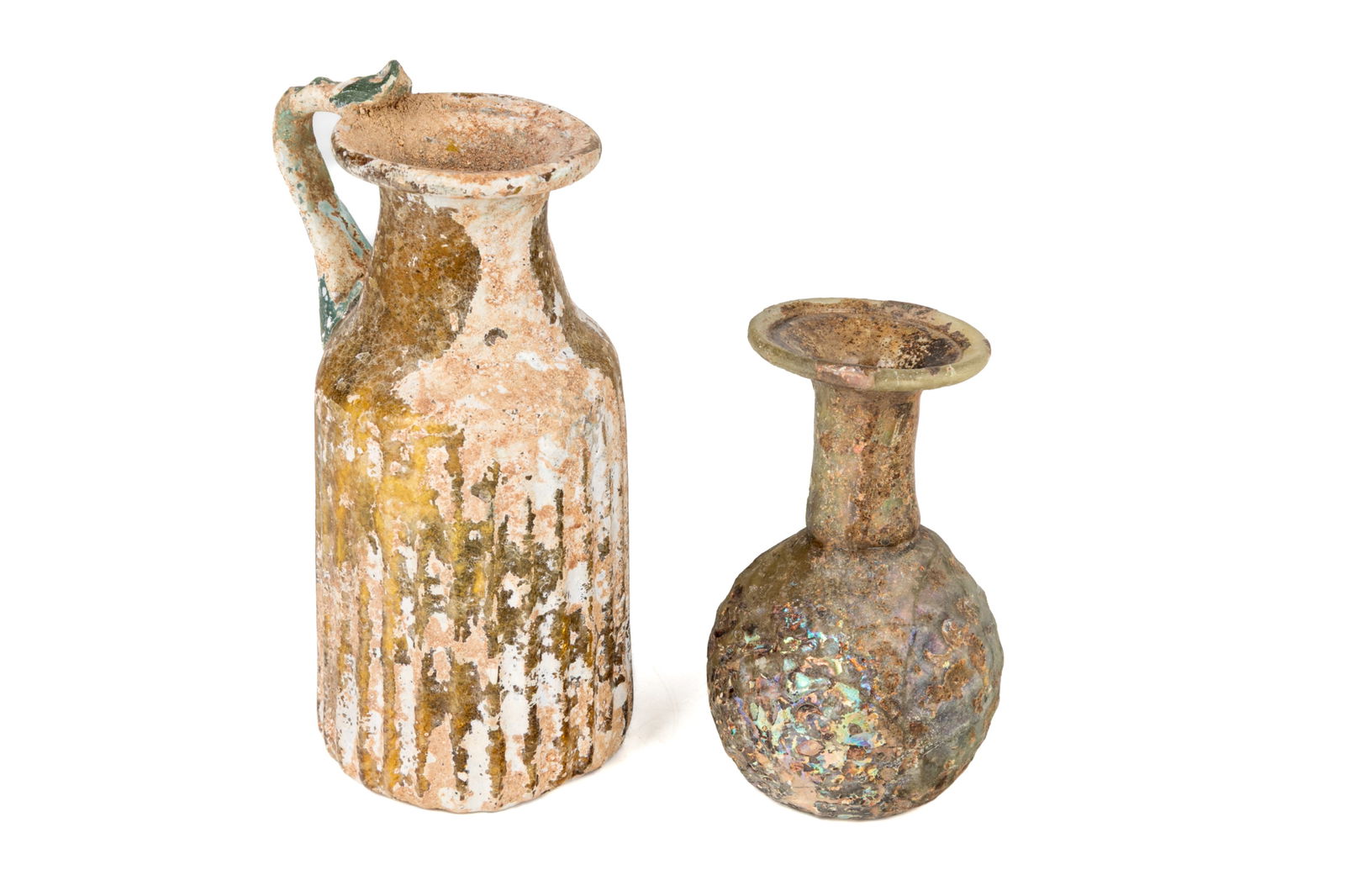 TWO ROMAN GLASS VIALS: Smaller glass date unknown Larger glass dated 1-3C CE Smaller: H. 3" x Dia. 1 1/8" Larger: H 4 3/4" x Dia. 1 3/4"