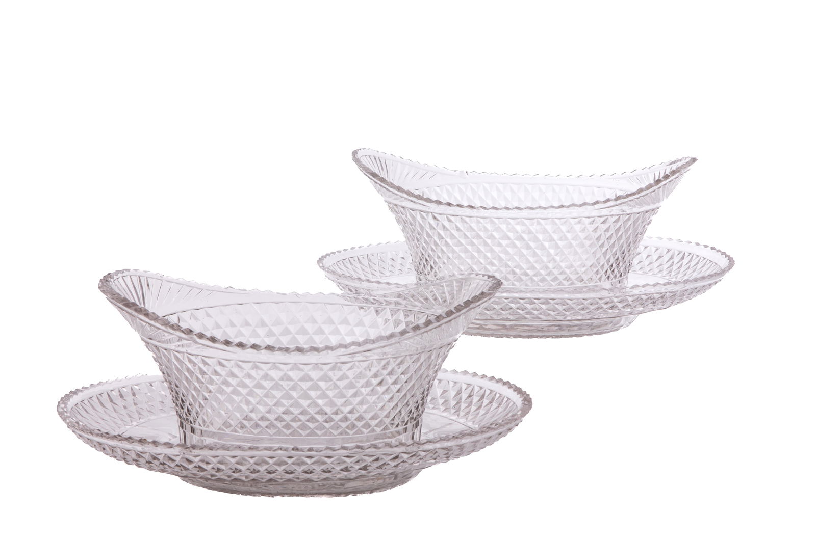 GEORGIAN PAIR OF CUT GLASS OPEN SWEET MEATS: Decorated with a diamond motif. Serrated edges Tray measurements: H. 1 3/4" x W.11 5/16" x D. 7 15/16"Bowl measurements: H. 4 7/16" x W. 9 1/4" x D. 6 1/2"