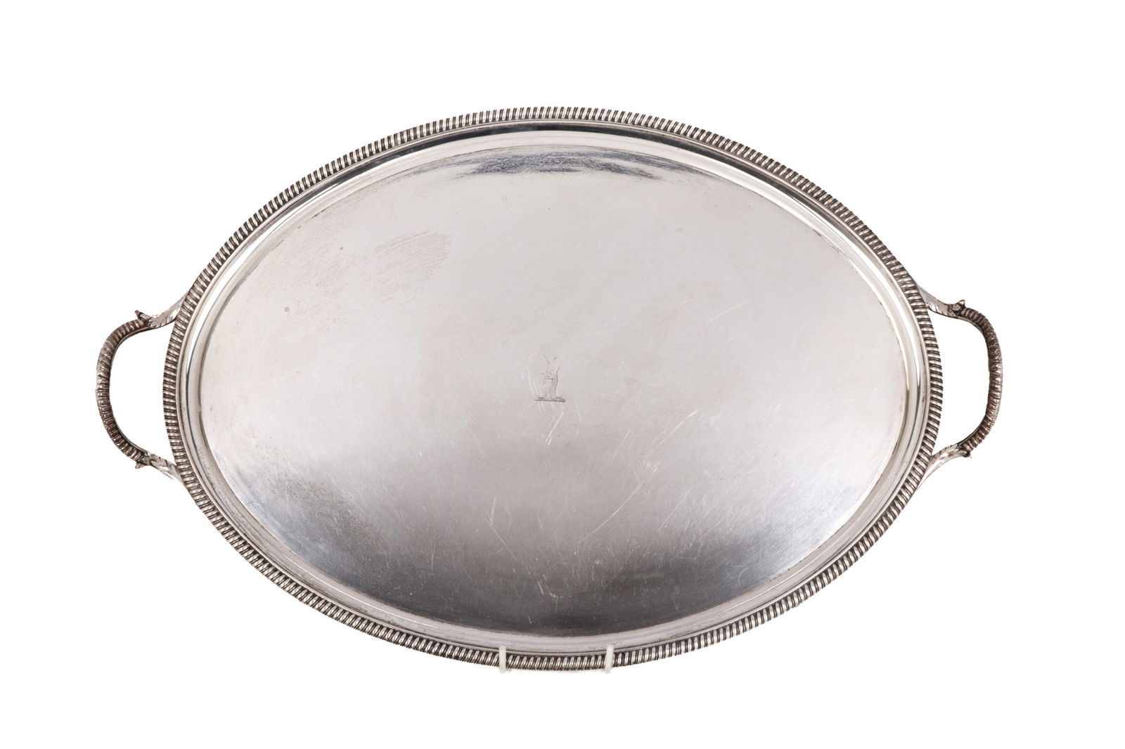 GEORGE III ENGLISH SILVER TEA TRAY, 1,864g: Simple tray with gadrooned border and handles, engraved crest. London, 1800, makers mark William Bennett. Weight 1864 g Length 20.5 in 52 cm