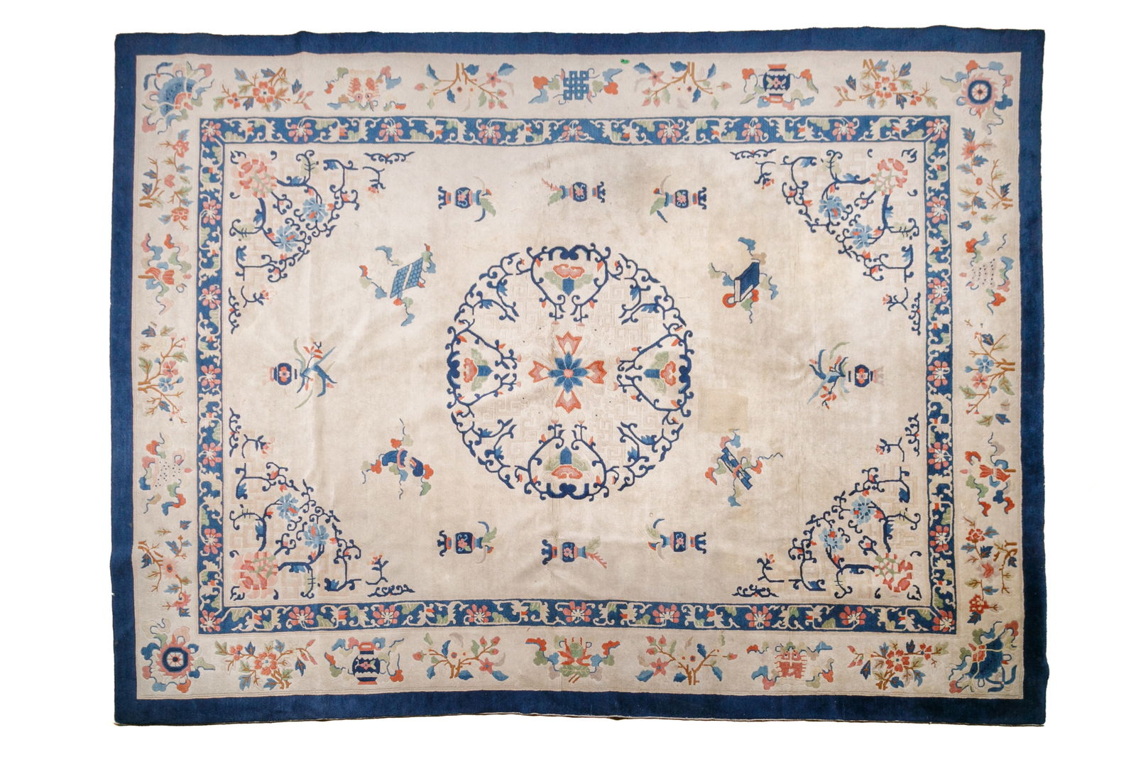 CHINESE ART DECO CARPET: Cream ground with Chinese antique and flowers around the border and central medalion, early 20th C. 12' X 8' 8"