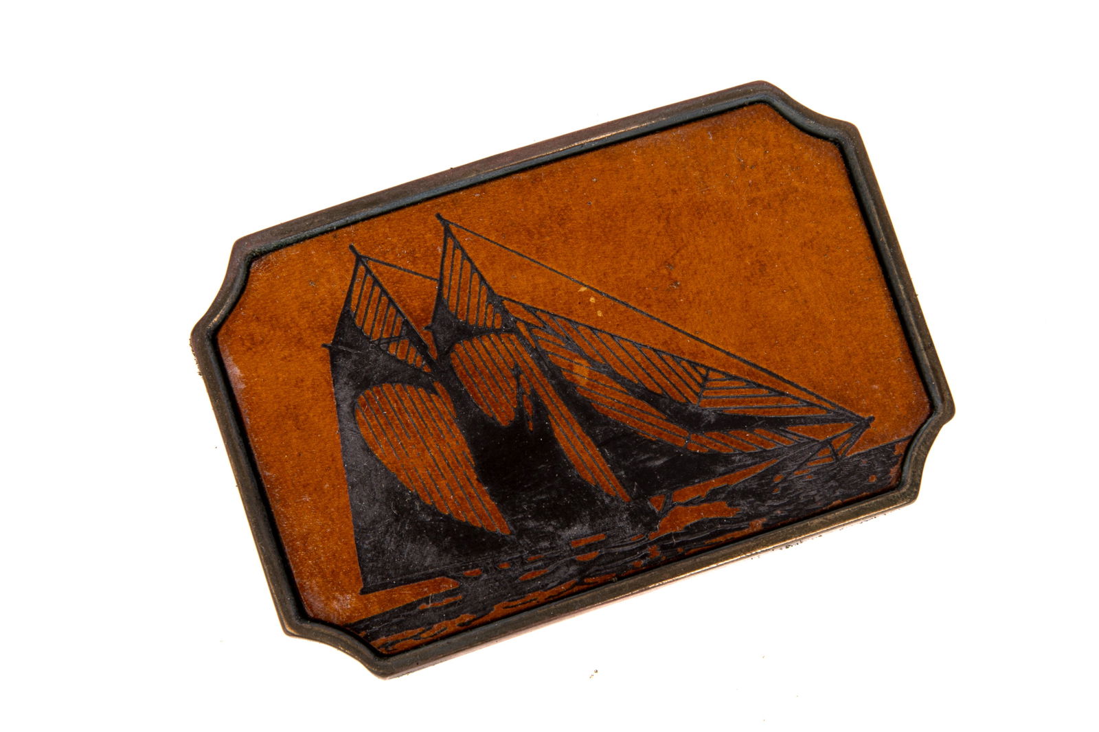 GORDON LIGHTFOOT'S BELT BUCKLE: American brass buckle with a leather inset depicting the SS Edmund Fitzgerald.