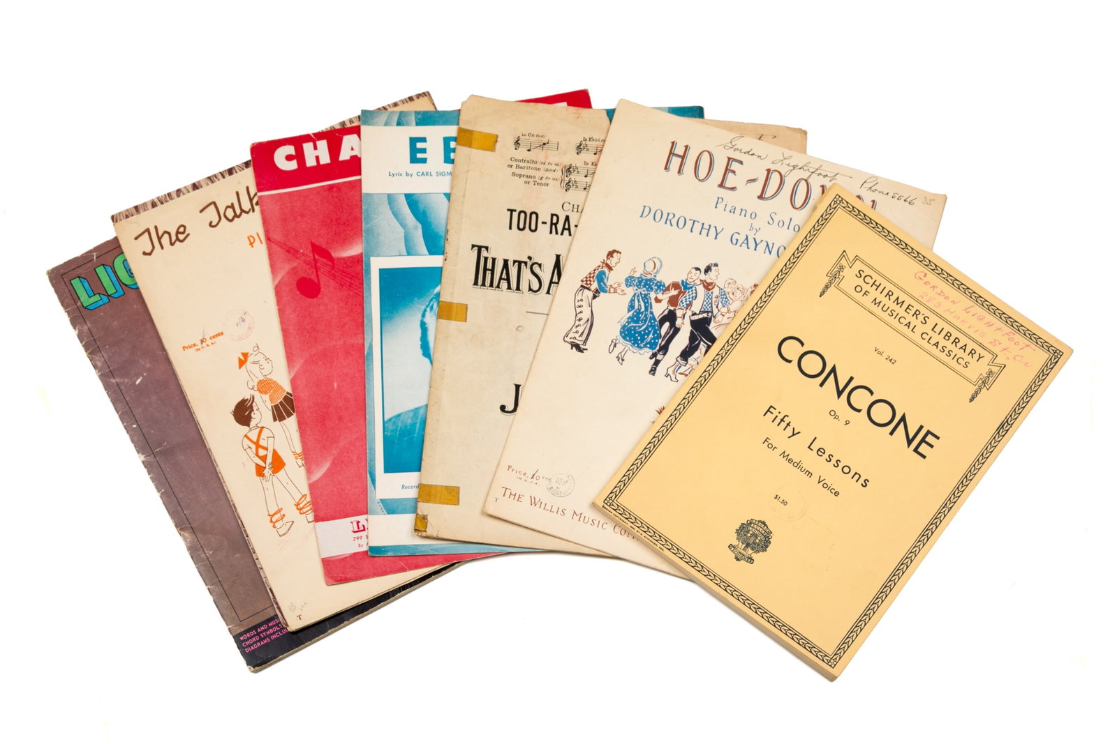 ASSORTED EARLY MUSIC BOOKS OWNED BY LIGHTFOOT: Music books from Lightfoot's early childhood with songs and music sheets, each with personalized doodles, notes and signatures.