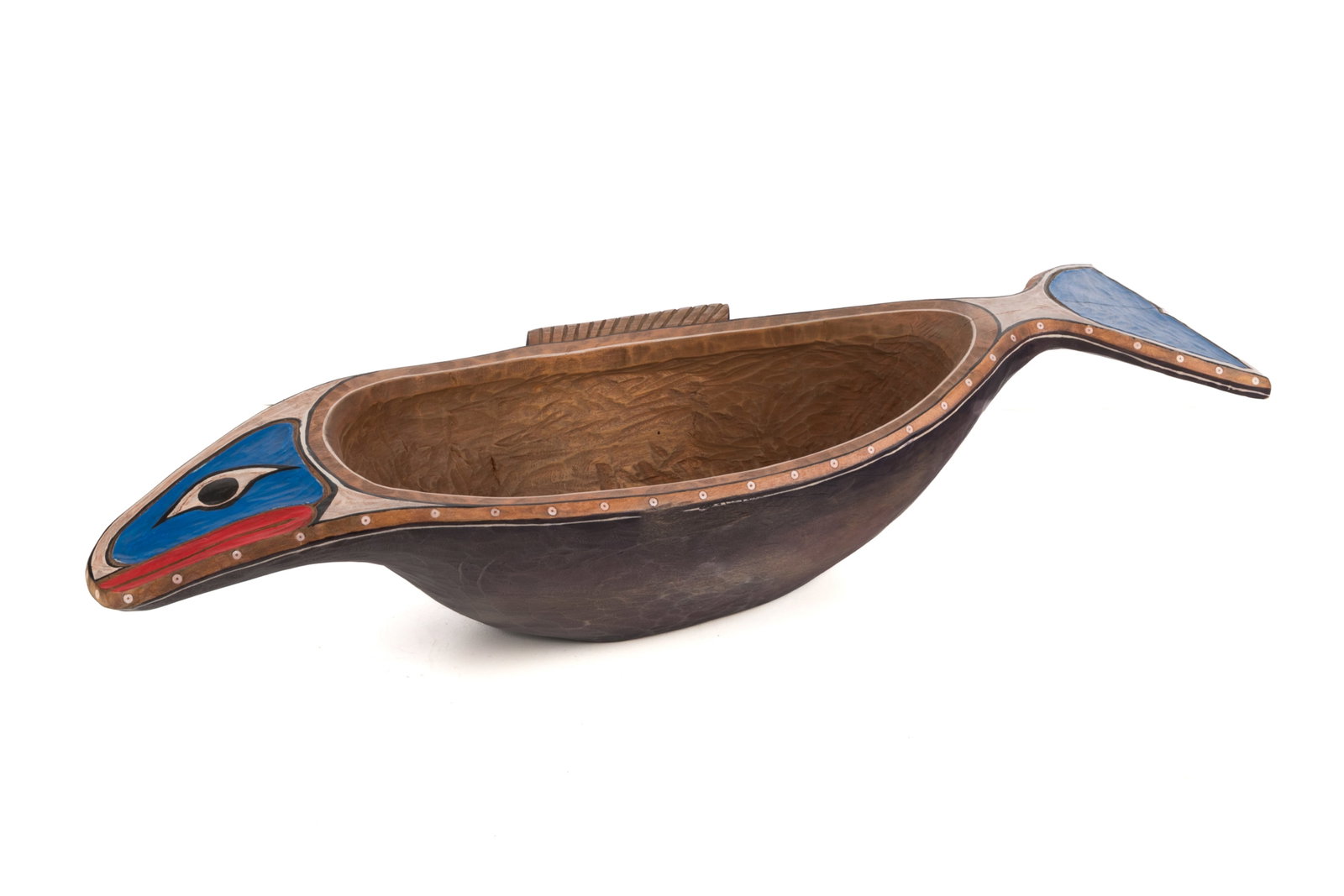 WEST COAST CARVING OF A BLUE WHALE BOWL: Haida type carved feast bowl with polychromed details. A gift to Gordon Lightfoot. L 26in.