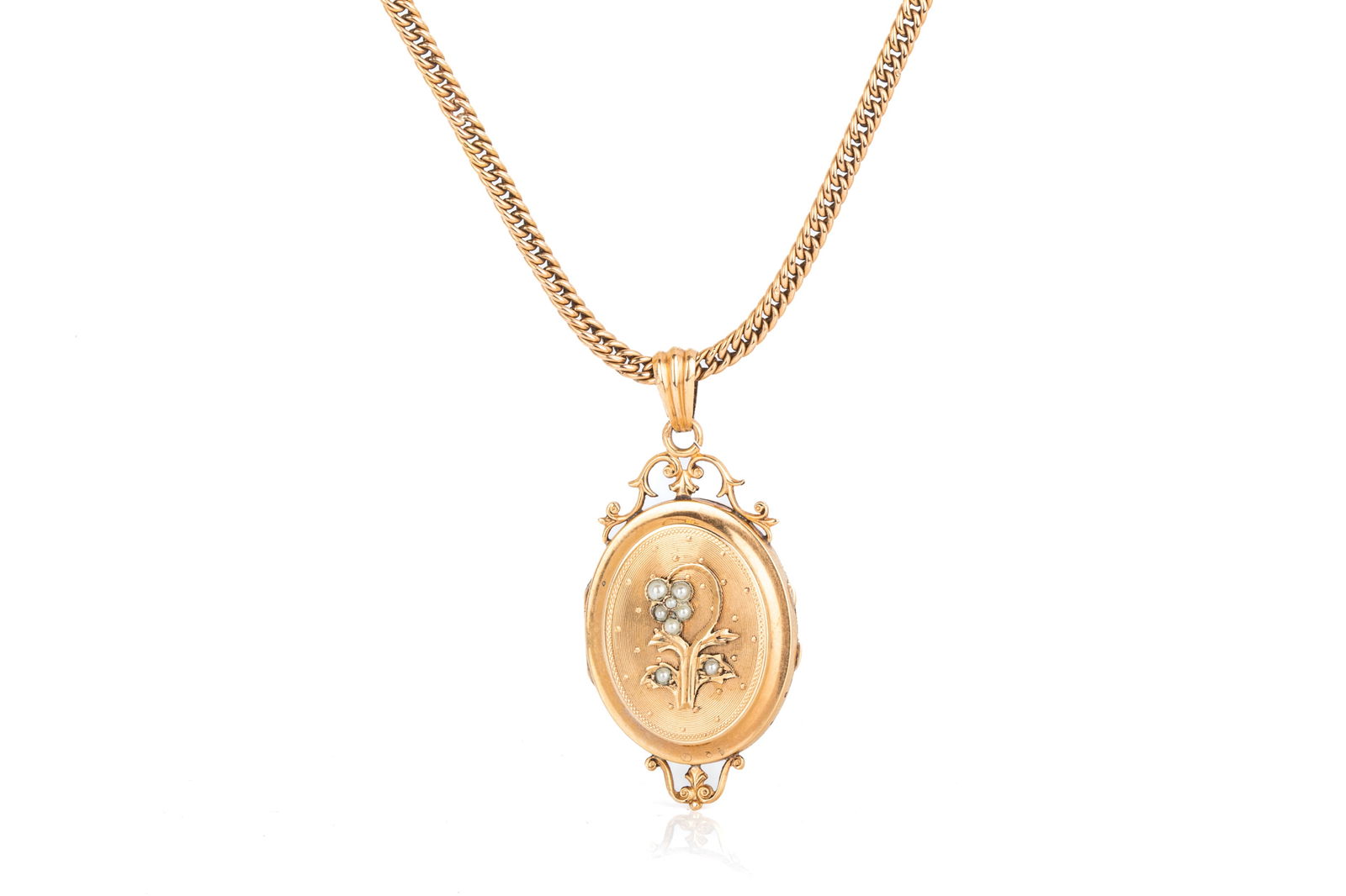 ANTIQUE 14K CHAIN & LOCKET w SEED PEARLS 12g: Antique yellow gold locket and chain testing approximately 14K, measuring 53.2mm long by 25.2mm wide, hollow constructed chain measuring 3.3mm wide by 17 inches long. Featuring front and back engraved