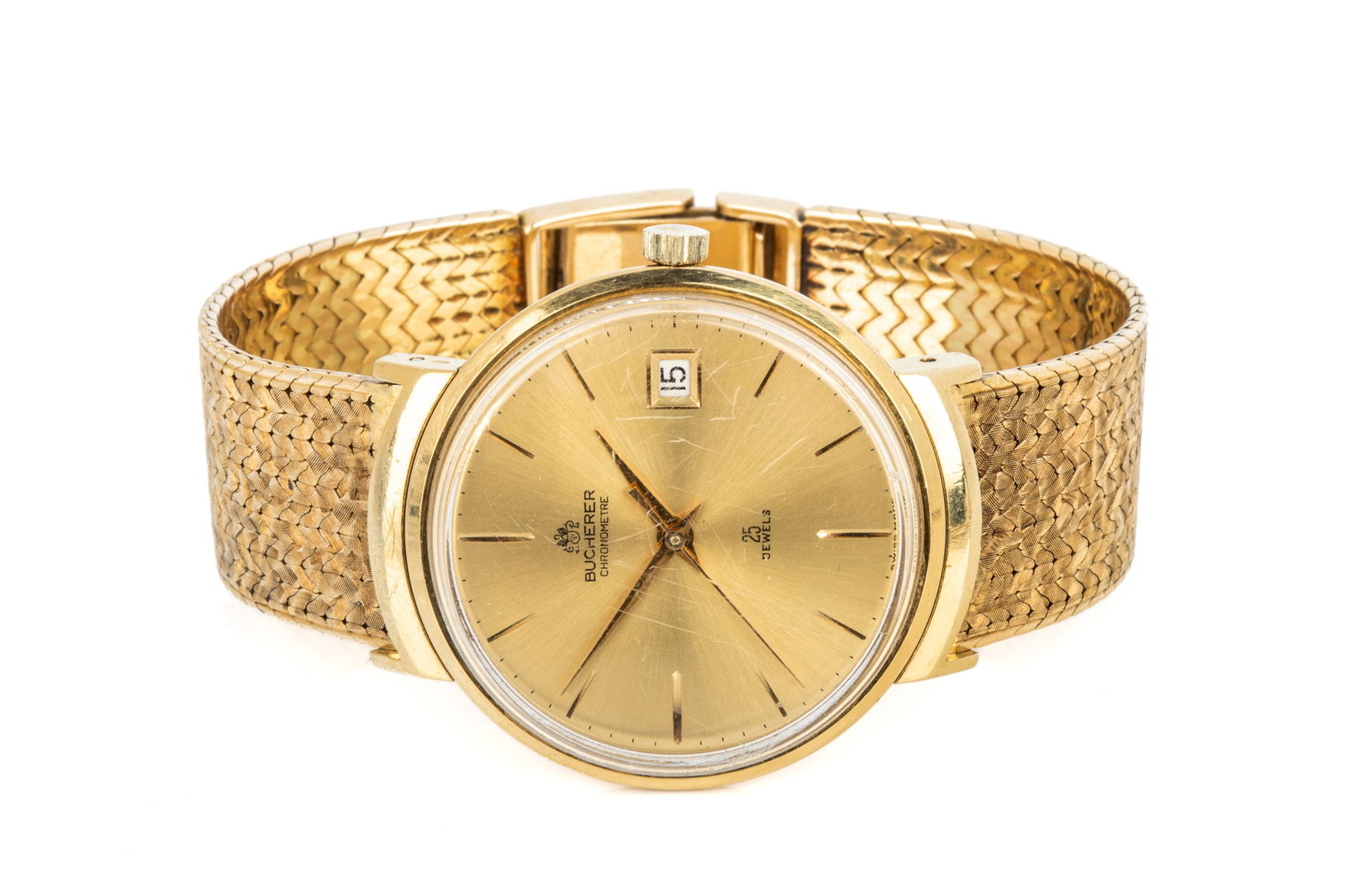 1967 18K GOLD BUCHERER MECHANICAL WATCH 80g: 18K yellow gold Bucherer mechanical chronometer rated date watch circa 1967, case measures 34.1mm wide and features Swiss Helvetia hallmarks, plastic crystal, date function, unsigned crown, and a beze