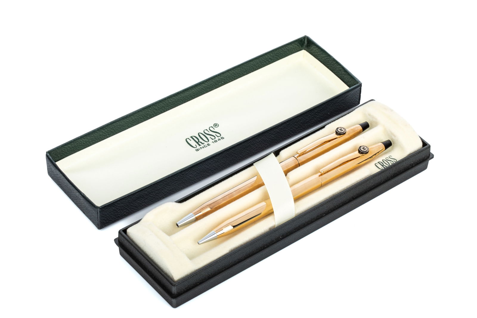 UNUSED 23K GOLD PLATED CROSS PEN SET w BOX: Pair of customized 23K gold plated cross pens featuring small McDermott emblem on both pocket clips. Original nesting box with warranty paperwork and SKU sticker on box bottom.