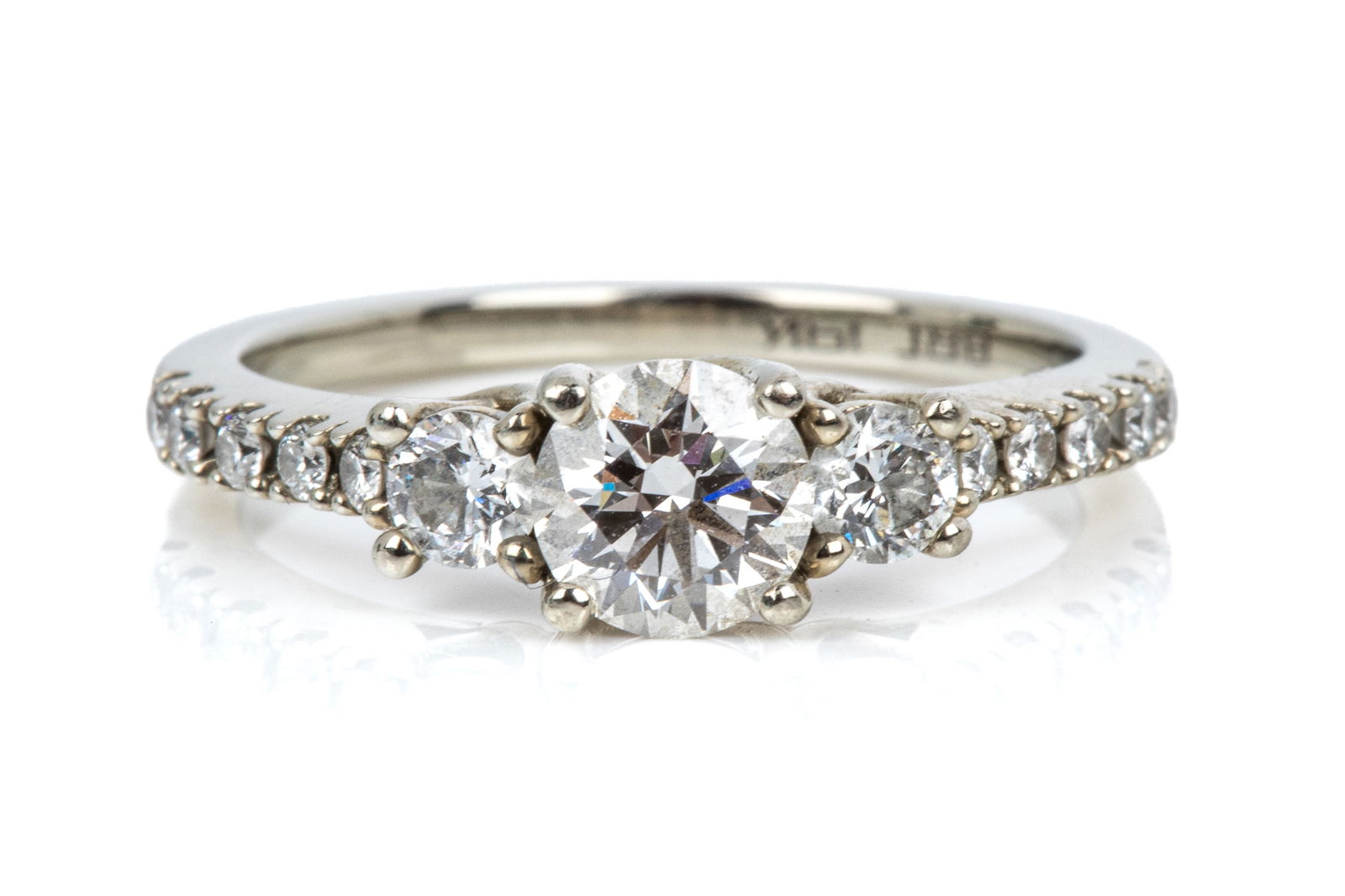 SPENCE DIAMONDS 19K ENGAGEMENT RING 2.9g: 19K white gold Spence Diamonds engagement ring with original box and paperwork. Set with all lab-grown diamonds of VS-SI-G-J quality, estimated total diamond weight 0.90cts. Size 6 2.9 grams