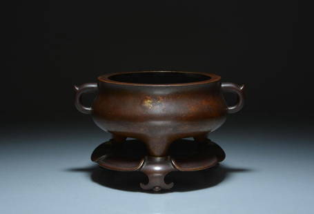 CHINESE 17TH CENTURY BRONZE CENSER & STAND: Compressed bombe form body with loop handles and tripod feet, with lotus leaf bronze base and carved hardwood cover with jade finial, apocryphal four-character seal script Xuande mark to base. L. 18cm