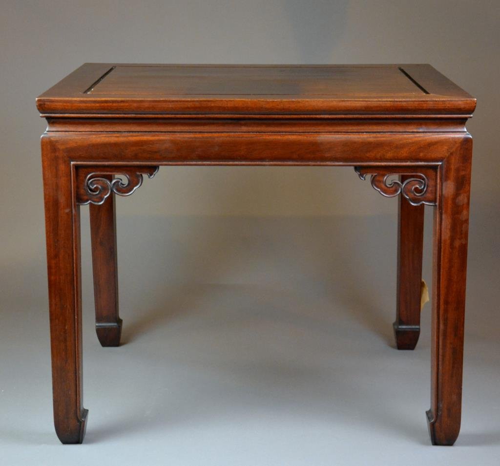 CHINESE CARVED WOOD SIDE TABLE: With carved section to top and scrolling cloud apron, on straight legs with low hoof feet . H. 55.5cm (21 7/8 in.)