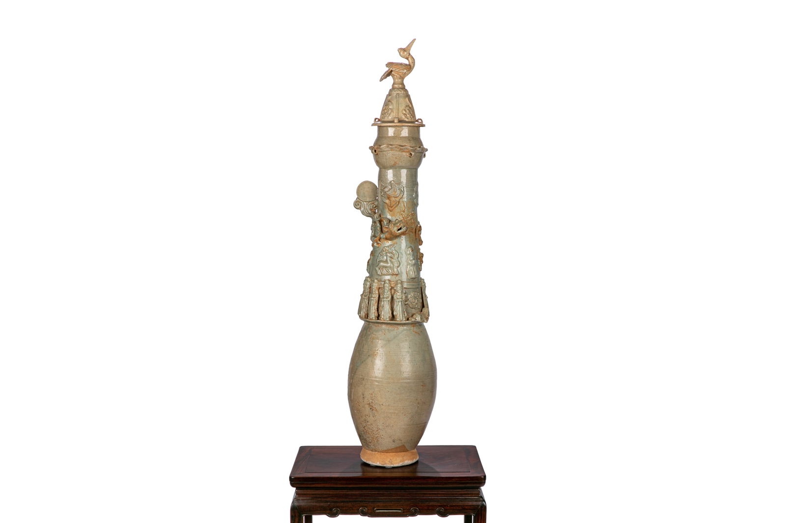 CHINESE QINGBAI GLAZED FUNERARY VASE: Chinese, Song to Yuan dynasty. Of tall, cylindrical form body, covered in light-green glaze, decorated with figures and dragon applied to the shoulder amongst cloud, with moon supported by cloud proje