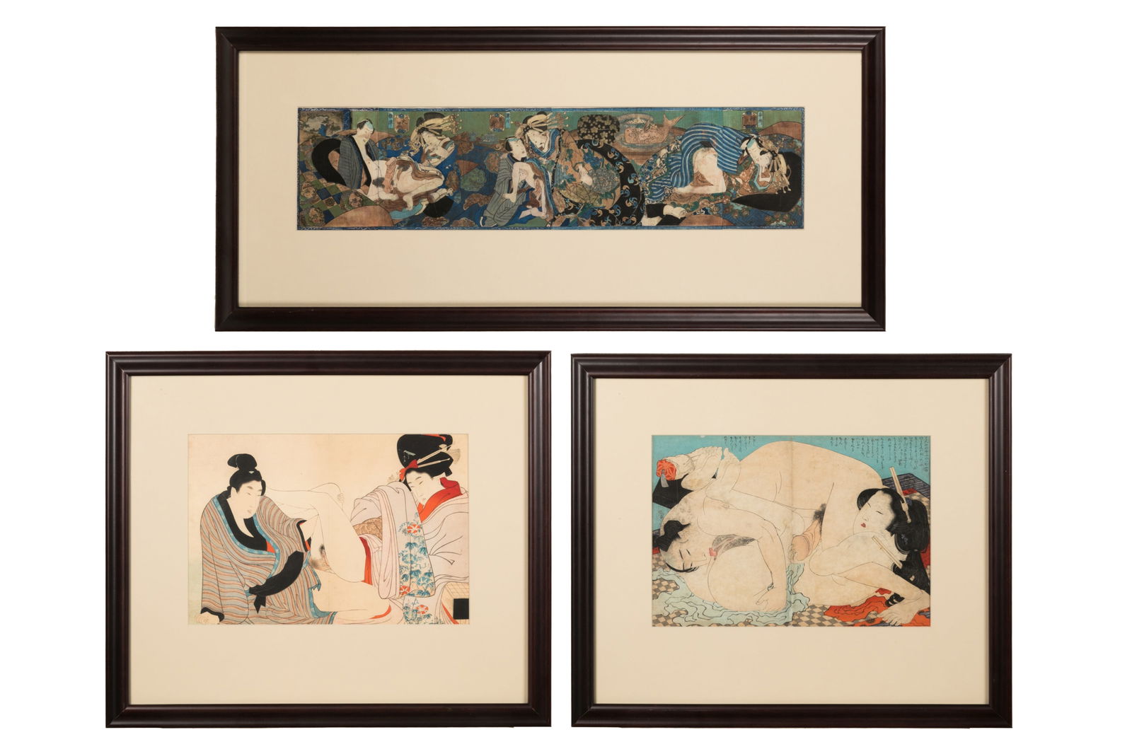 A SET OF THREE SHUNGA PRINTS, EDO AND MEIJI PERIOD: Attributed to Utagawa Kunimori II (active 1830–1861) Shunga (Three Erotic Scenes), c. late 1860s - early 1870s (Edo period)Scroll, woodblock print Undated and unsigned 25.25 x 6.125 inches Attribute