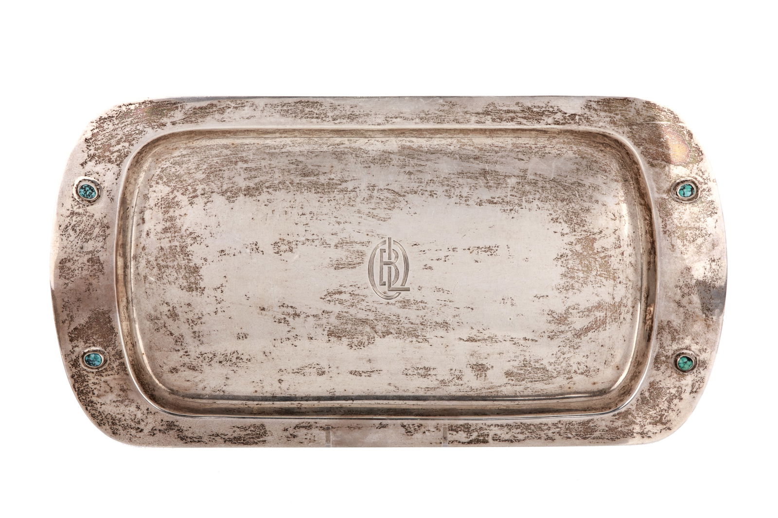 LIBERTY ARTS & CRAFTS SILVER TRAY, 547g: Attributed to Archibald Knox with four turquoise mounted cabochons, engraved monogram. Birmingham, 1906, Liberty & Co. L 38cm (15in)