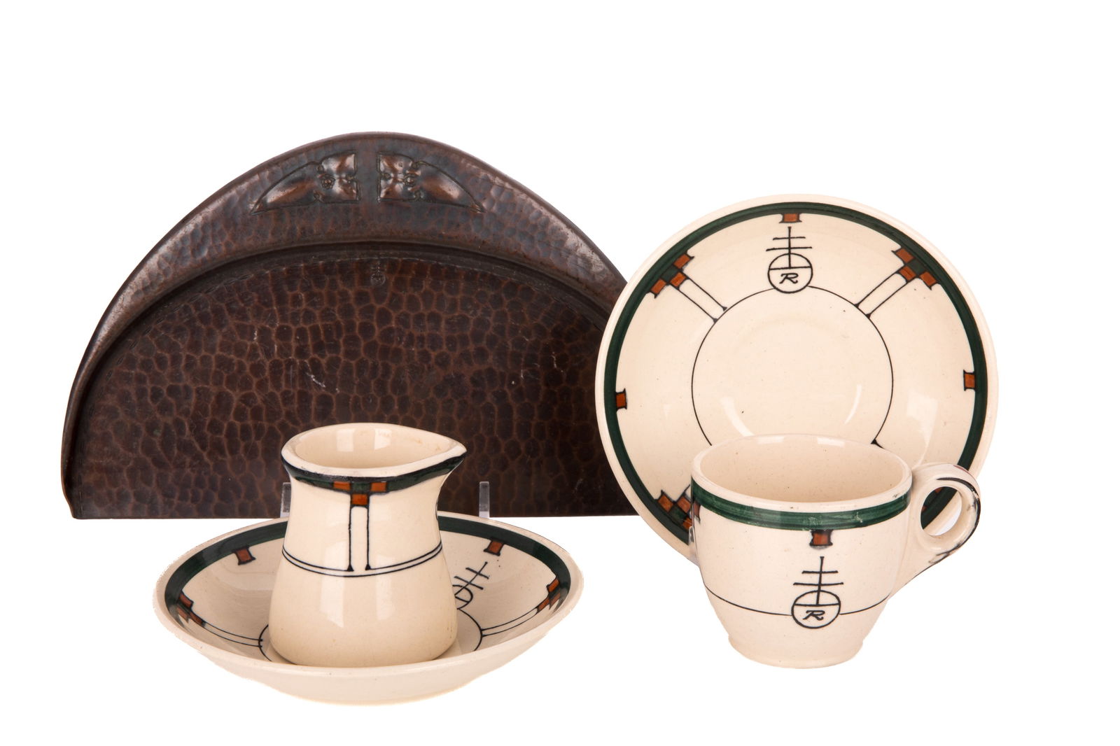 GROUP OF AMERICAN ARTS & CRAFTS ROYCROFT: Including a copper crumber tray, cups and saucer, extra saucer and milk jug Buffalo pottery. Length of crumber 21cm (8 1/4in)