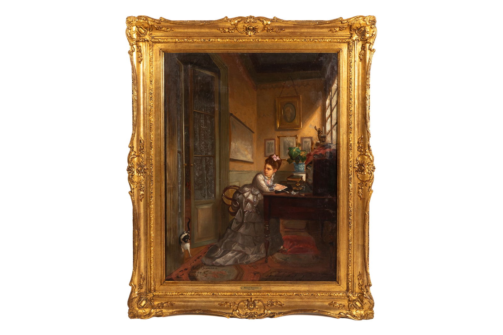 MANUEL OCARANZA (Mexican, 1841-1882): "iAh! Es el gato" (1873) Oil on canvas Signed and dated lower left Sight H. 33 5/8" x W. 24 1/2