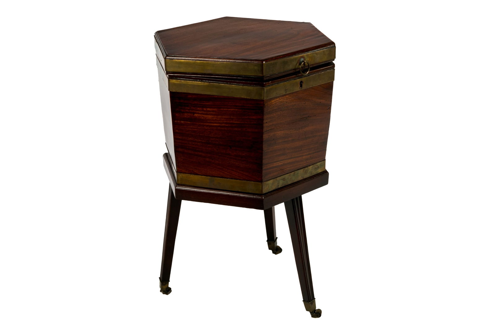 GEORGE III ENGLISH MAHOGANY WINE CELLARETTE: Hexagonal form with brass banding, four compartment interior raised on tripod base, English, late 18th C. H. 27" x D. 18"