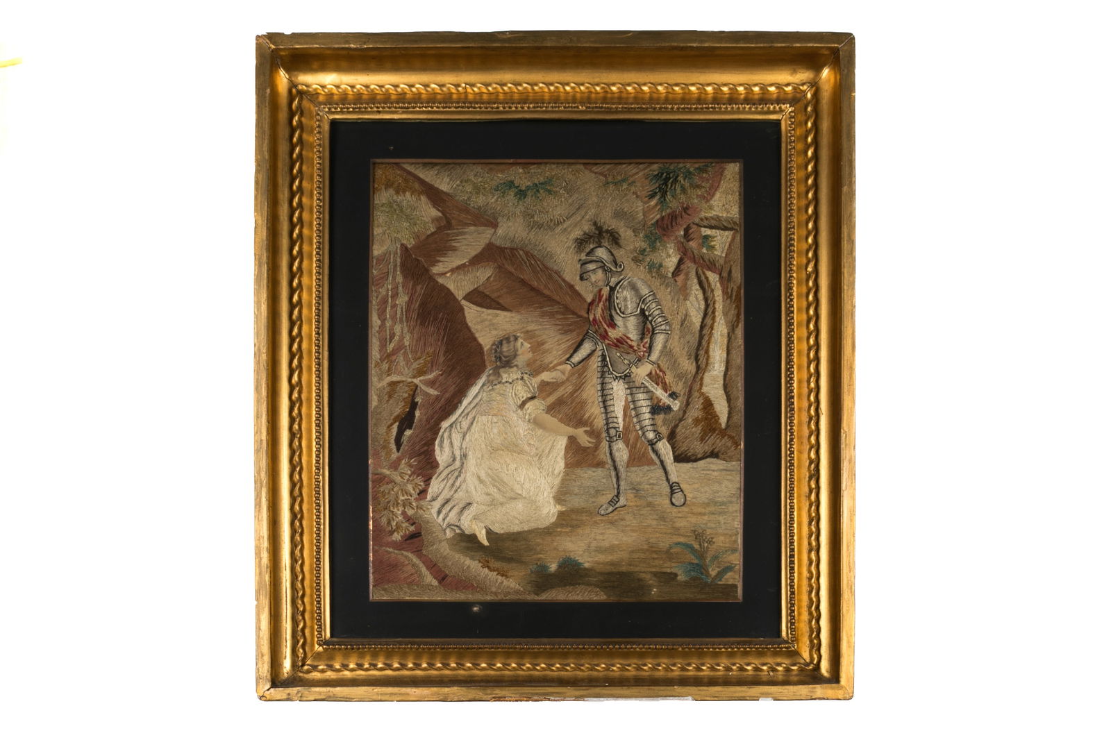 GEORGE III NEEDLEWORK PICTURE: Of knight in shining armor and damsel in distress in a wooded scene. H 20 3/4" x L 18 1/2"