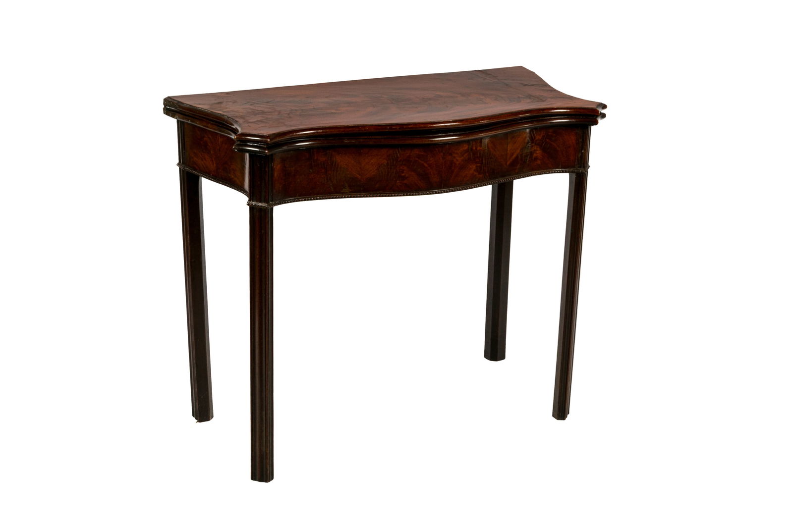 GEORGE III ENGLISH MAHOGANY FLIP TOP TABLE: Serpentine front with reeded Chippendale influenced legs. Top open H. 26" x W. 35" x D. 35"