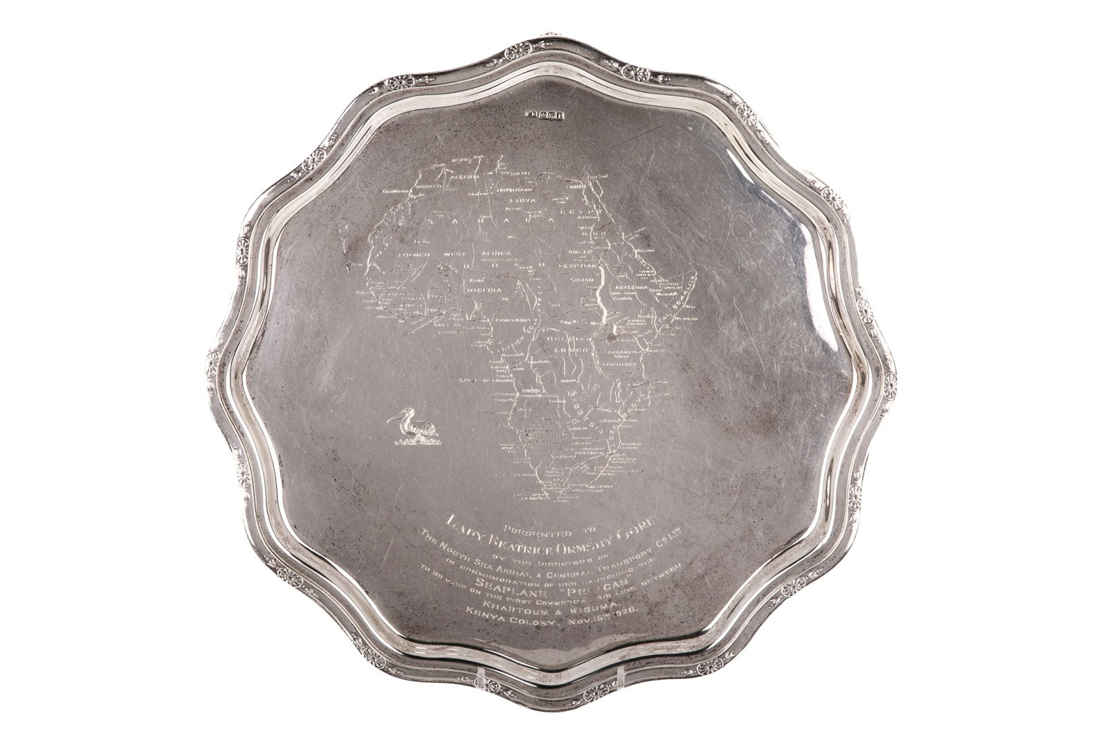 SPECIAL AFRICA PRESENTATION SILVER SALVER, 1015g: An English sterling silver presentation salver, Sheffield 1926, maker Frank Cobb. The salver is engraved with a detailed map of continental Africa and a presentation inscription. The