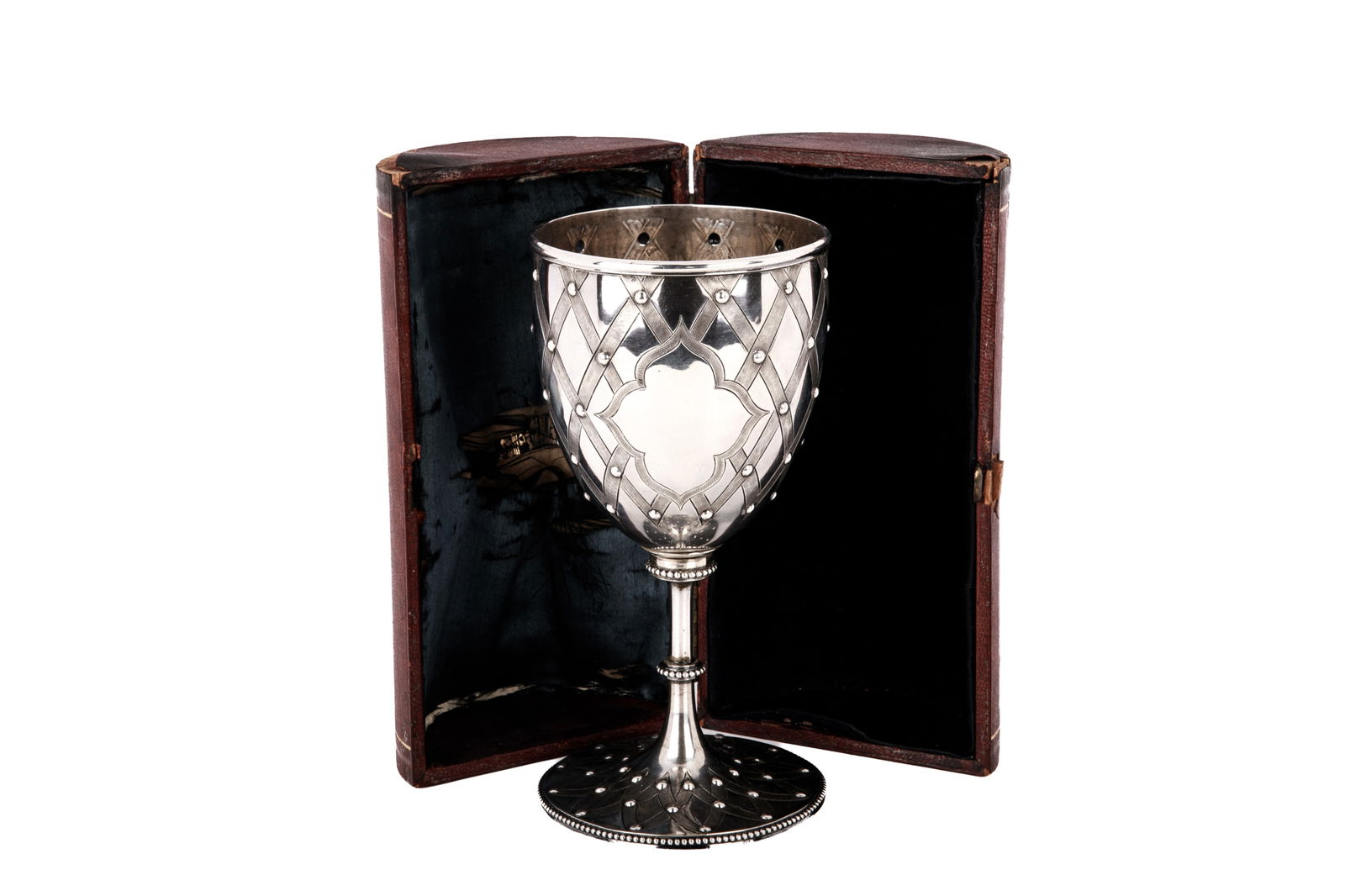 VICTORIAN ENGLISH SILVER PRESENTATION GOBLET, 249g: Ribbon pattern to the goblet with engraved presentation Cocanada (today known as Kakinada) Sky Races Half Mile Won By P.J. Simmons Port Admiral 1867. With original leather case, ofIndian colonial
