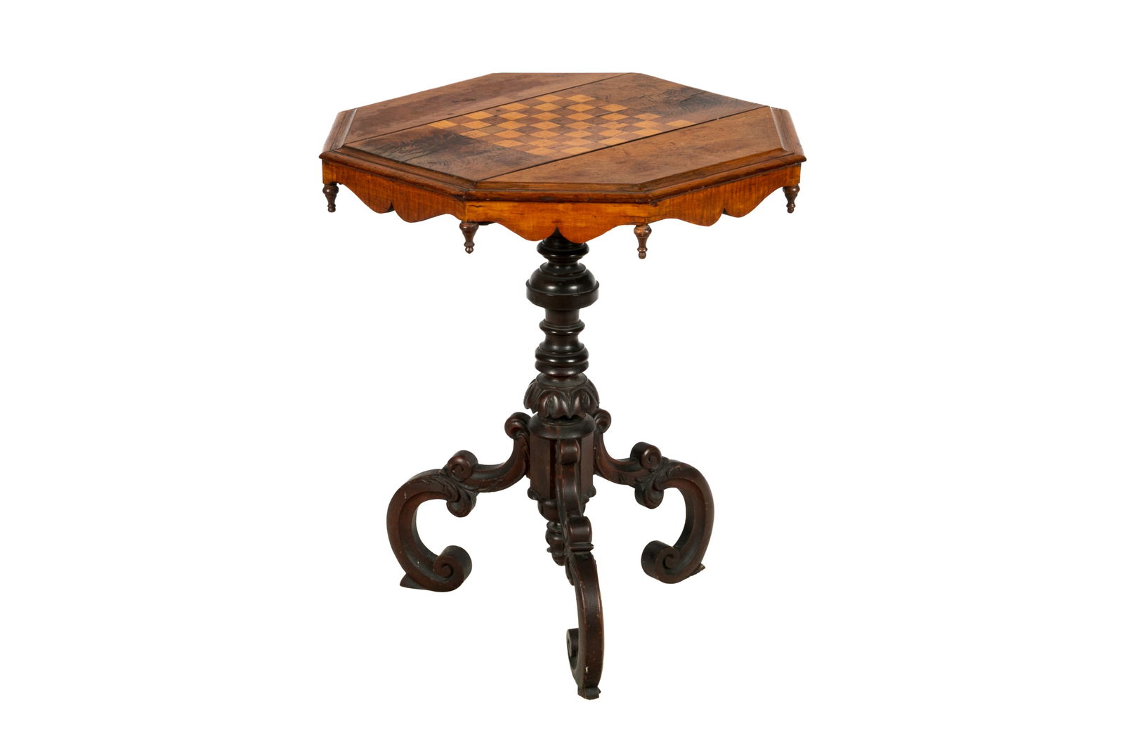 ANTIQUE TIGER MAPLE AND EBONIZED GAMES TABLE: Octagonal table top on a carved tripod base. H. 28" x D. 24"