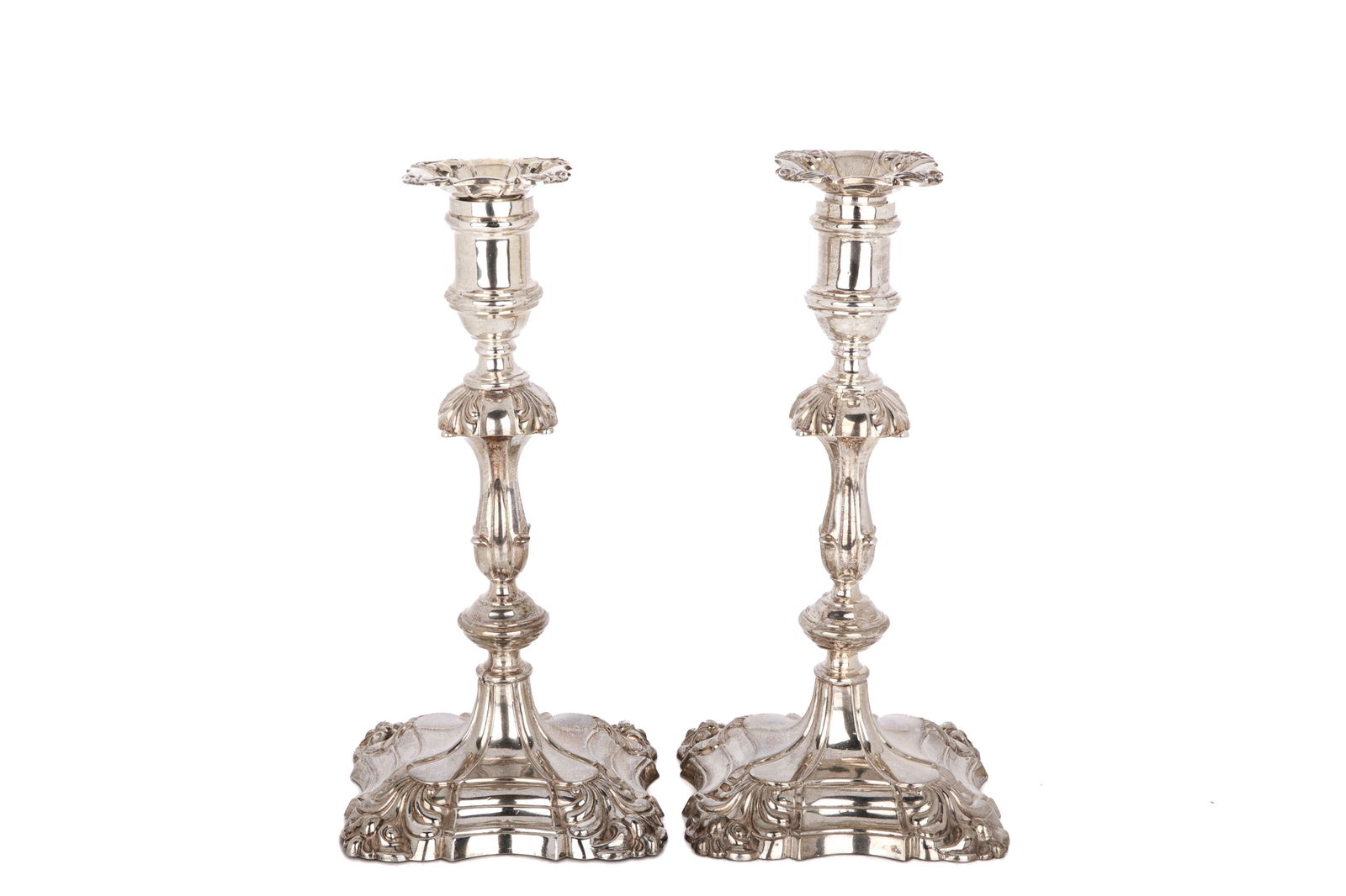 LARGE ENGLISH SILVER CANDLESTICKS: A large pair of English sterling silver candlesticks, Sheffield, 1902, maker Hawksworth Eyre & Co. The bases and stems highlighted with acanthus decoration. Height 28 cm not weighable