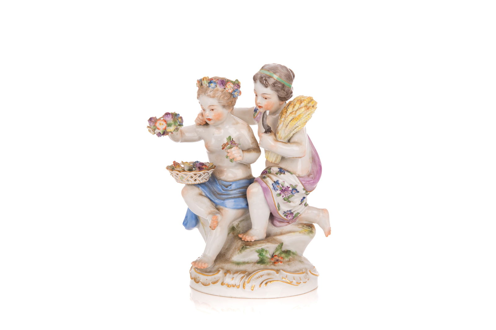 MEISSEN PORCELAIN FIGURAL GROUP OF THE HARVEST: Of two young figures in classical robes holding wheat and flowers, cross swords marks. H. 3 3/4"