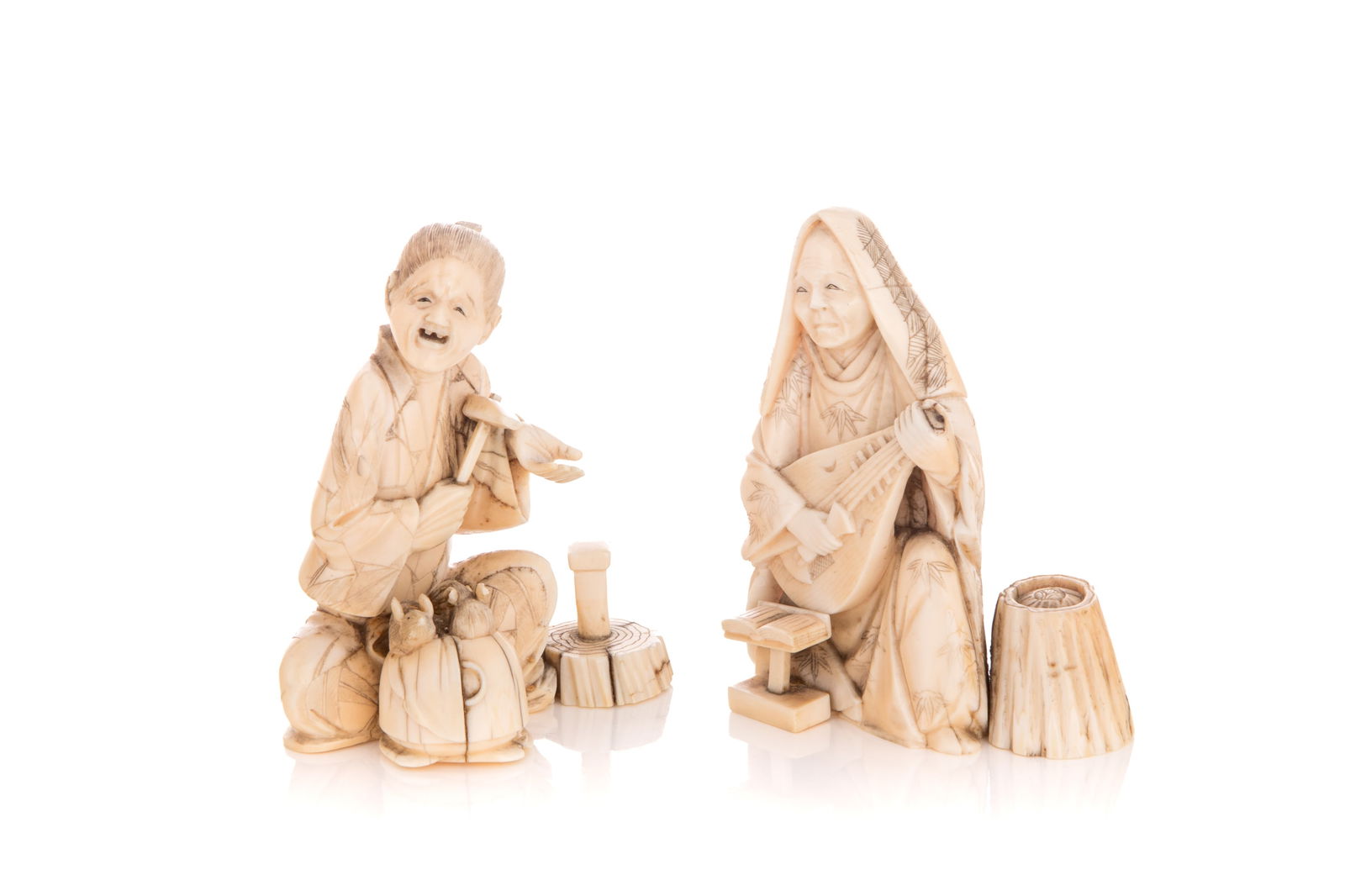 TWO JAPANESE NATURALLY CARVED OKIMONO: Of two old figures holding tools and musical instruments, signed on bottom, Meiji period. H. 3 3/4"