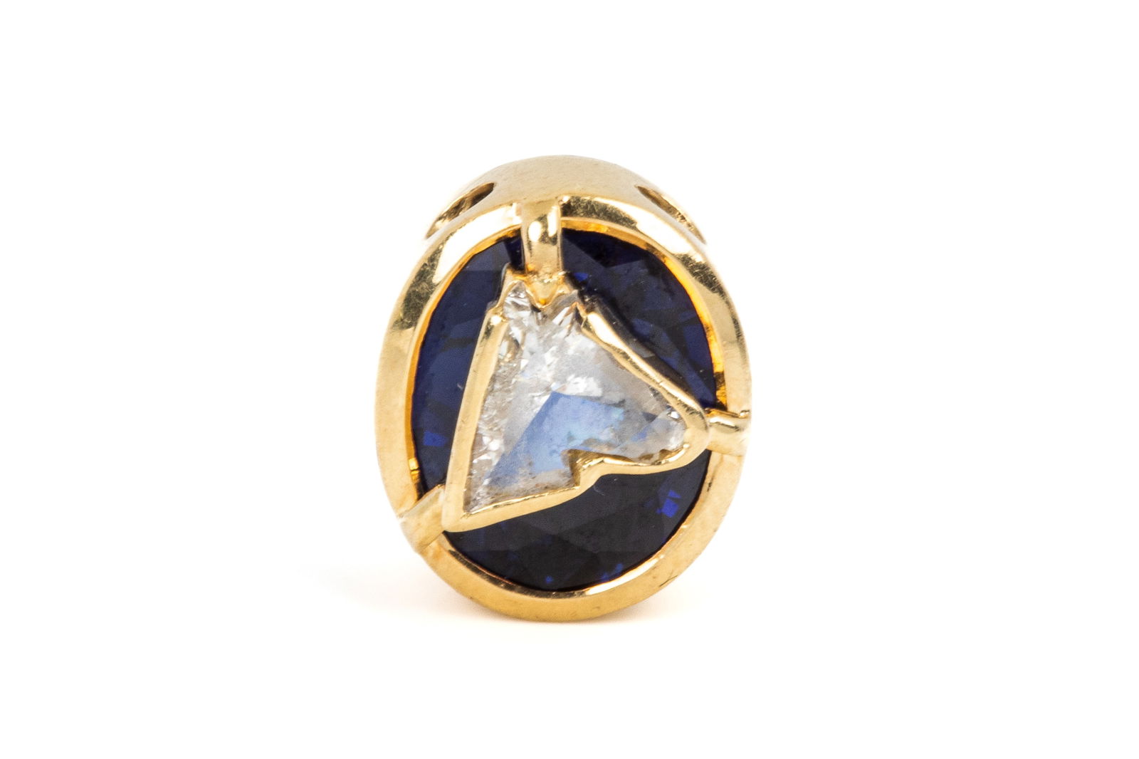 HORSE HEAD DIAMOND & SAPPHIRE SLIDE PENDANT 3.8g: Yellow gold custom made slide pendant testing approximately 14K, measuring 12.9mm long by 10.8mm wide by 8.1mm thick. Featuring bezel set horse head brilliant cutdiamond measuring approximately 7.30mm