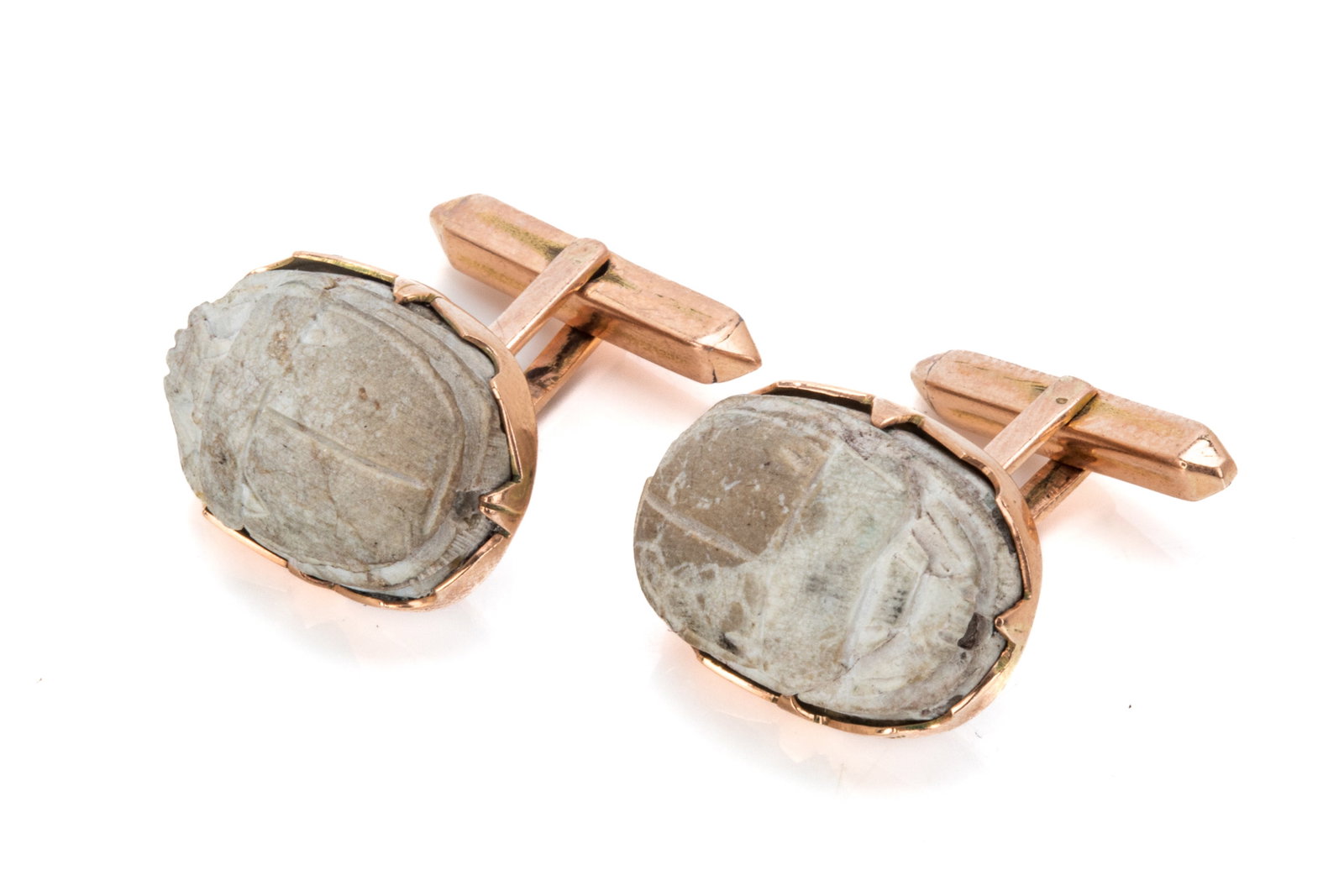 14K GOLD & CARVED STEATITE SCARAB CUFFLINKS 10.5g: Rose gold carved steatite (soapstone) scarab beetle cufflinks testing approximately 14K, equipped with bullet backs The cufflinks measure 19.3mm long by 14.4mm wide10.5 grams
