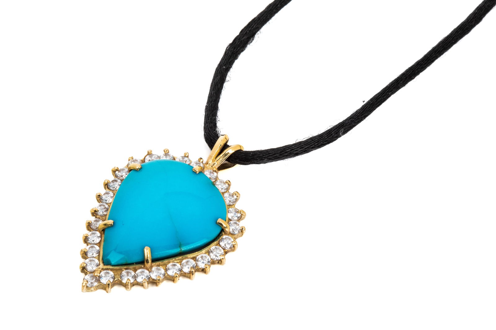 18K GOLD TURQUOISE PENDANT ON BLACK CORD 14.2g: Yellow gold pendant testing approximately 18K measuring 42.4mm long by 28.7mm wide, hanging from 18 inch long black fabric cord with 18K yellow gold Italian made end caps and lobster clasp.Featuring b
