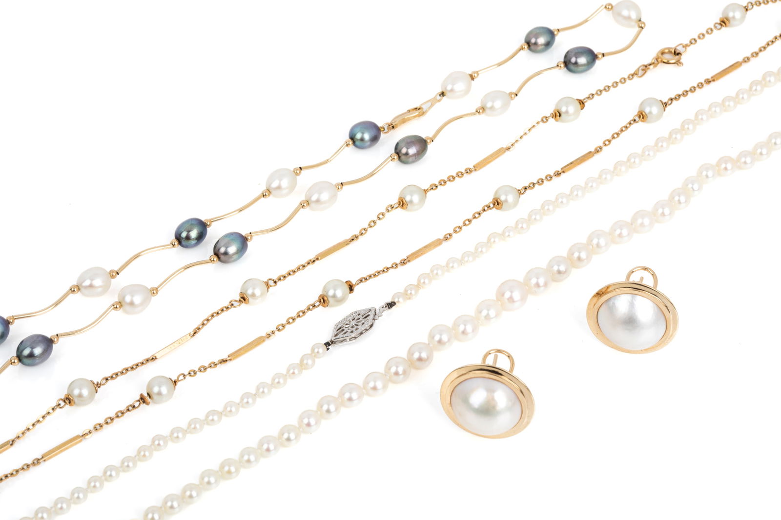 PEARL NECKLACE TRIO w MABE PEARL STUDS, 10K & 14K: 14K yellow gold black and white pearl station chain measuring 18 inches long featuring 6.2mm wide oval freshwater pearls. 8.3 grams10K yellow gold white pearl station chain measuring 28 inches long by