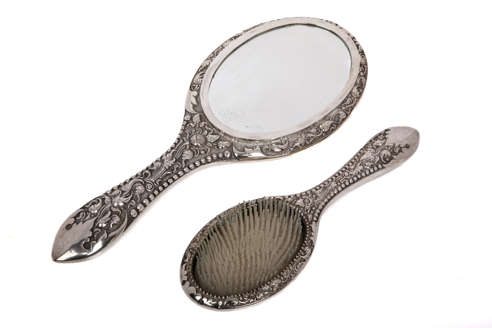 .800 SILVER FOLIATE TWO PC DRESSER SET: Including a hand brush and mirror.