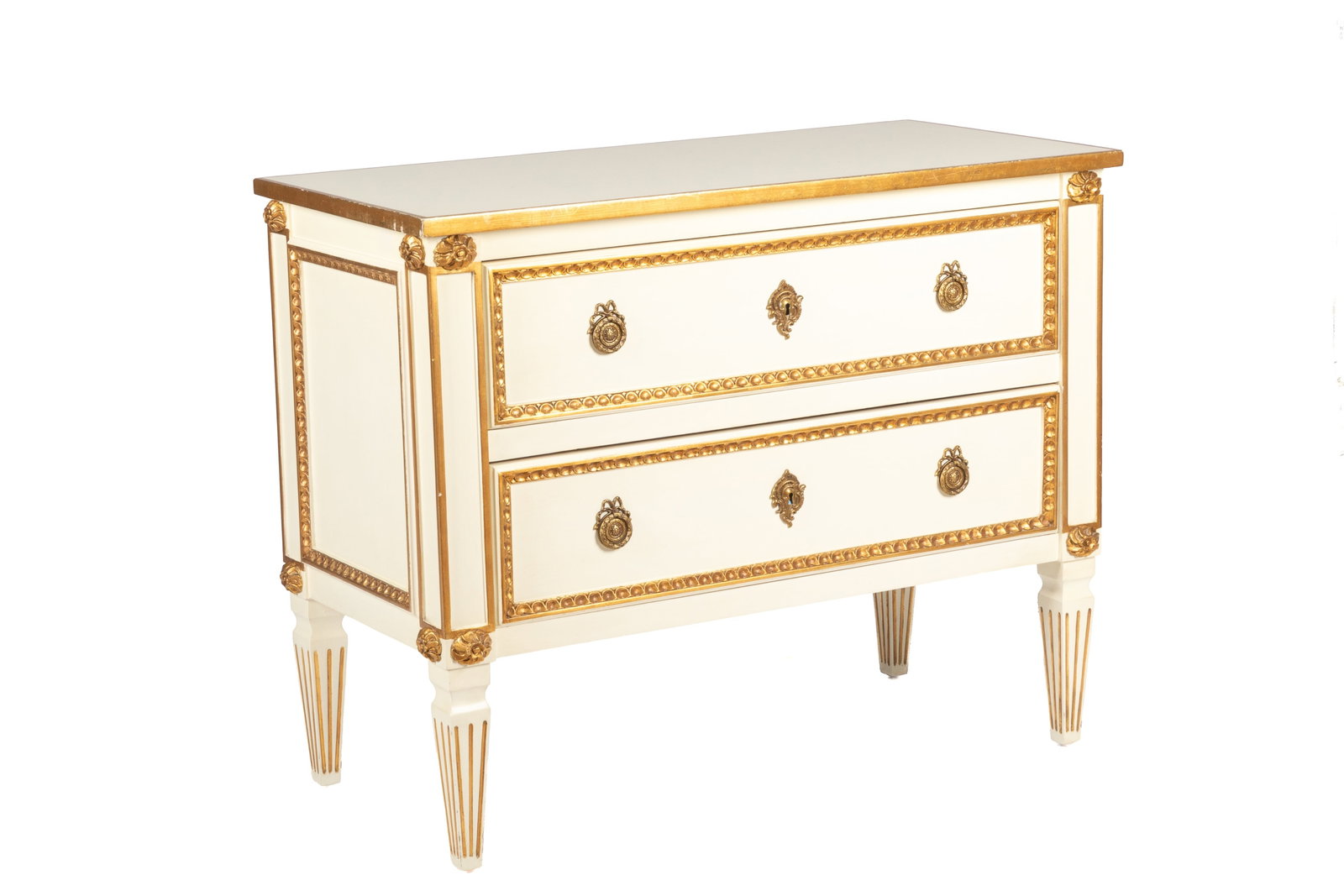 AMERICAN MADE TWO DRAWER CHEST: Cream painted with gilded accents. H: 34 1/4" W: 43" D: 20 1/2"