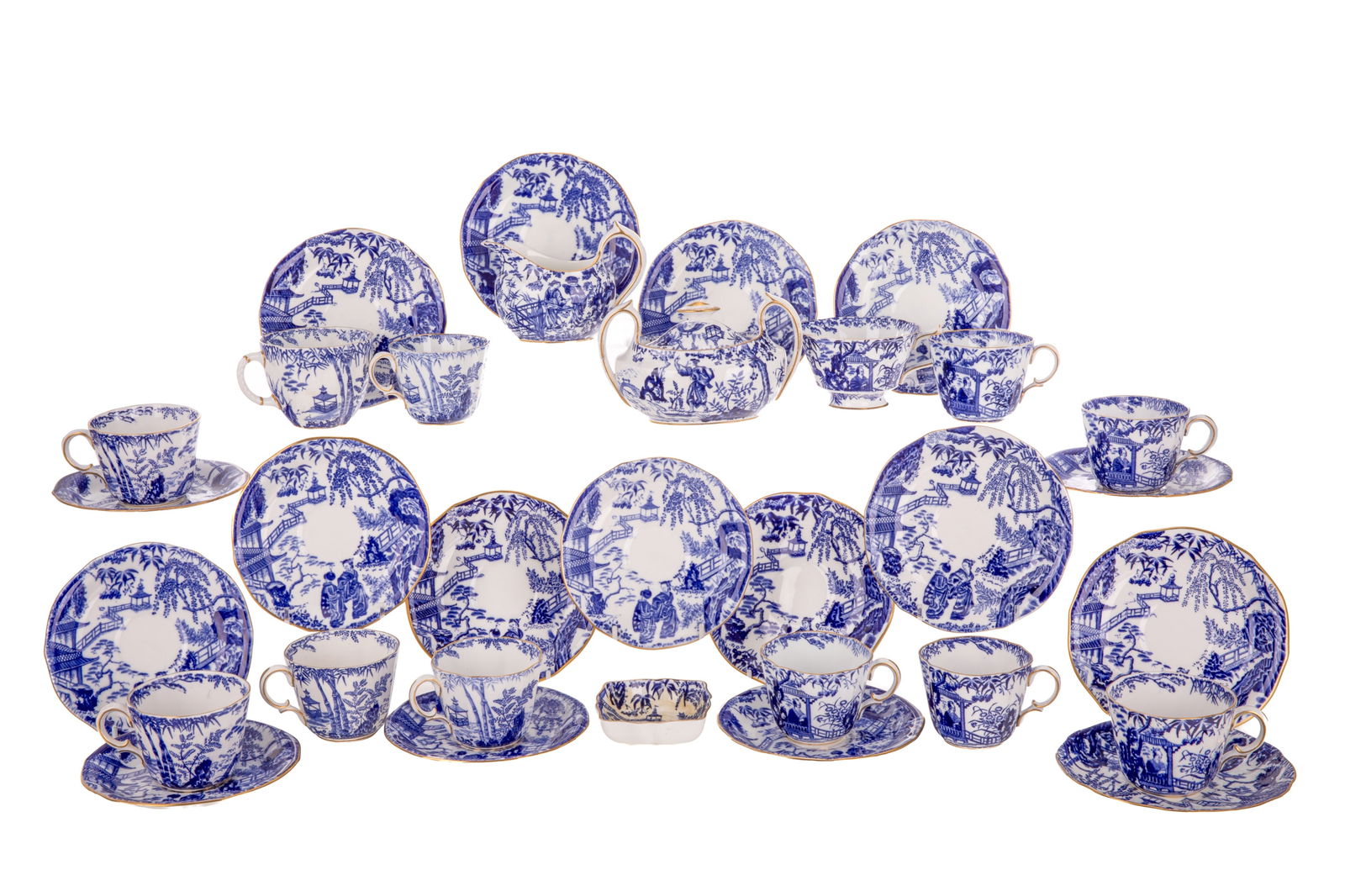 TWENTY PIECES OF ROYAL CROWN DERBY MIKADO: Including a sugar bowl with lid, a creamer, a small square tray, and seventeen teacups and matching saucers. Each piece stamped with makers mark to underside of various dates. English, 20thcentury. H.