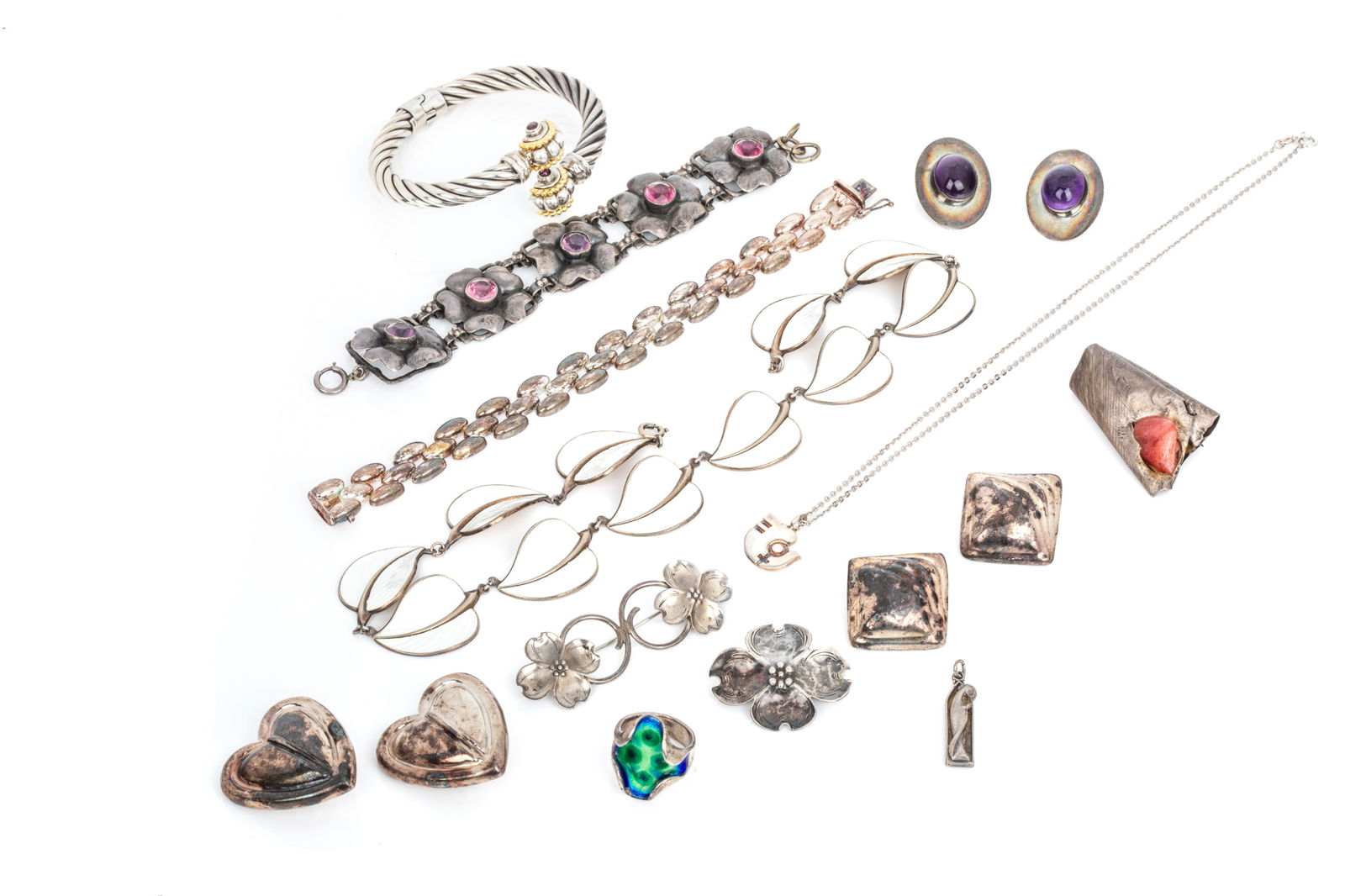 MIXED SILVER ARTISAN JEWELLERY 202.5g: Sterling silver made in Norway leaf necklace measuring 15 inches long by 20.5mm wide. 45.6 grams Hobe sterling floral link bracelet with pink andpurple stones. 7 inches long by 24.6mm wide. 30.4