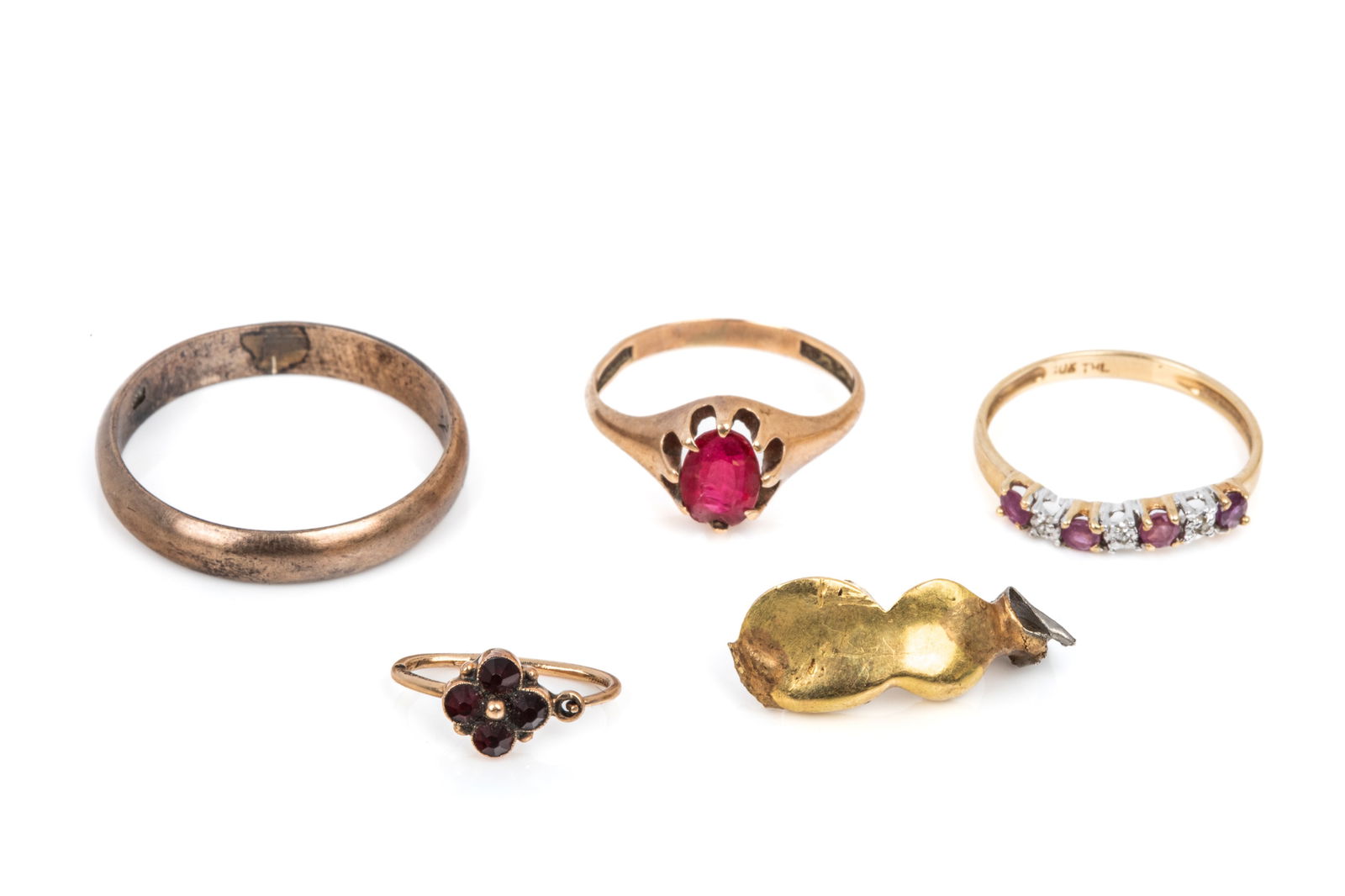 MIXED GOLD GROUPING 10g: 10K asymmetrical contour band measuring 2.9mm wide, featuring petite diamonds and pink sapphire. Size 6.25 1.1 grams10K buttercup style ring with chipped oval stone. 1.7 grams 10K plain gold band