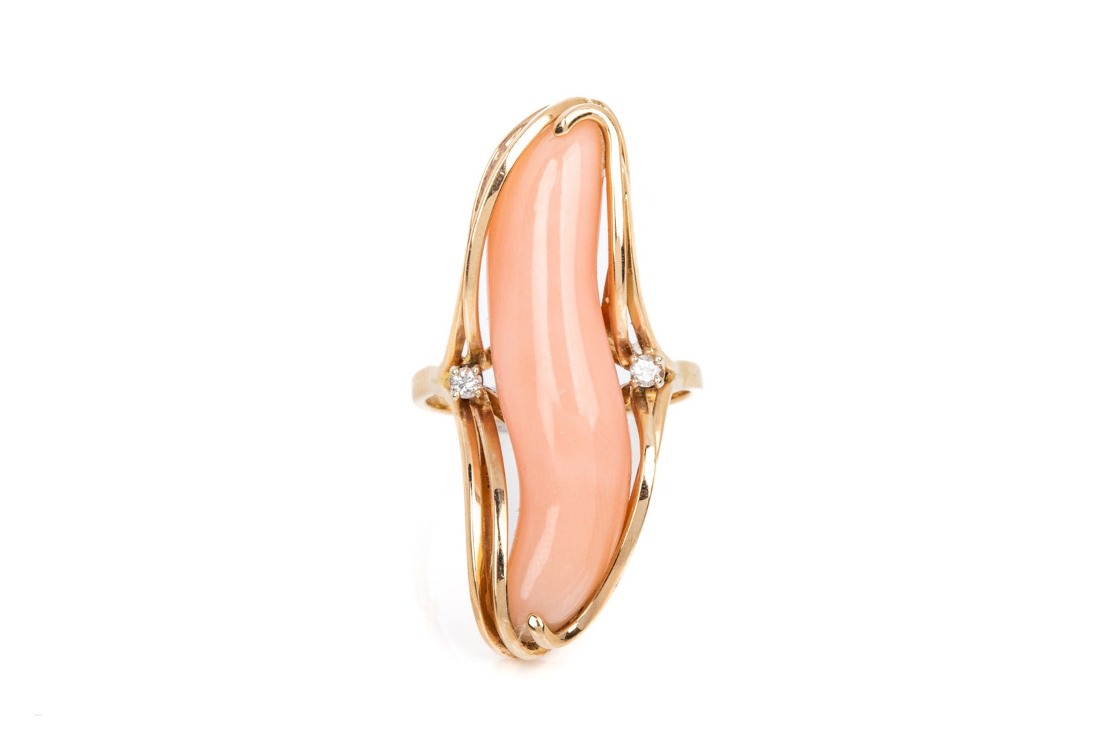 14K GOLD ANGEL SKIN CORAL & DIAMOND RING 9.4g: 14K yellow gold statement ring measuring 36.8mm long. Featuring freeform angel skin coral accented by 2 round brilliant cut diamonds of SI-I1-FG quality. Size 8 (approximate) 9.4 grams