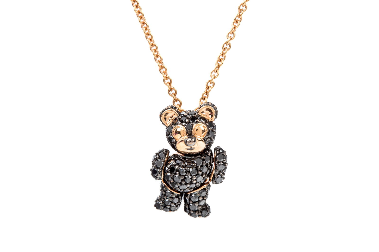 18K ARTICULATED BLK DIAMOND TEDDY NECKLACE 6.8g: 18K Italian-made rose gold articulated dancing teddy bear necklace, measuring 15 to 16.5 inches wearable length by 1.3mm wide, equipped with lobster clasp and ring ends. Teddy bear measures 17.2mm tal