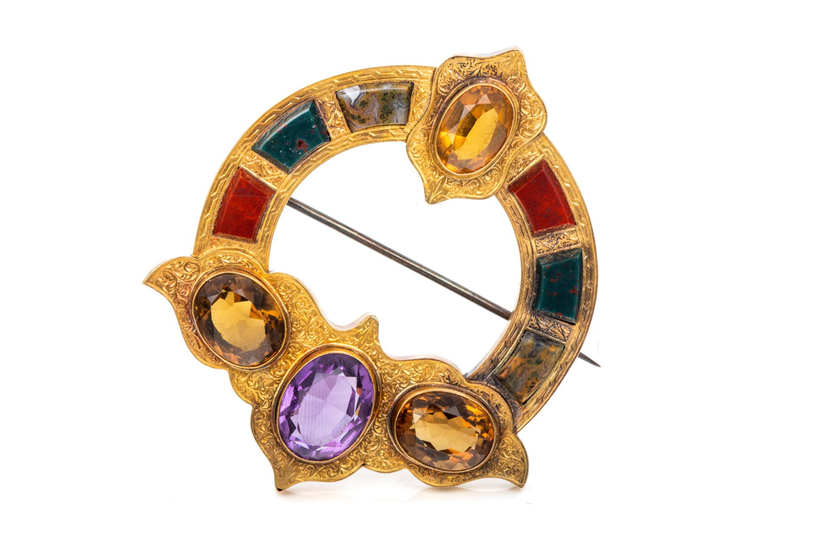 14K ANTIQUE VICTORIAN GEMSTONE KILT PIN 22.3g: Victorian era kilt pin testing approximately 14K, measuring 62.6mm by 53.5mm, equipped with tube hinge, C catch, and low karat curved pin. Featuring oval mixed cut amethyst and citrine, custom cut blo