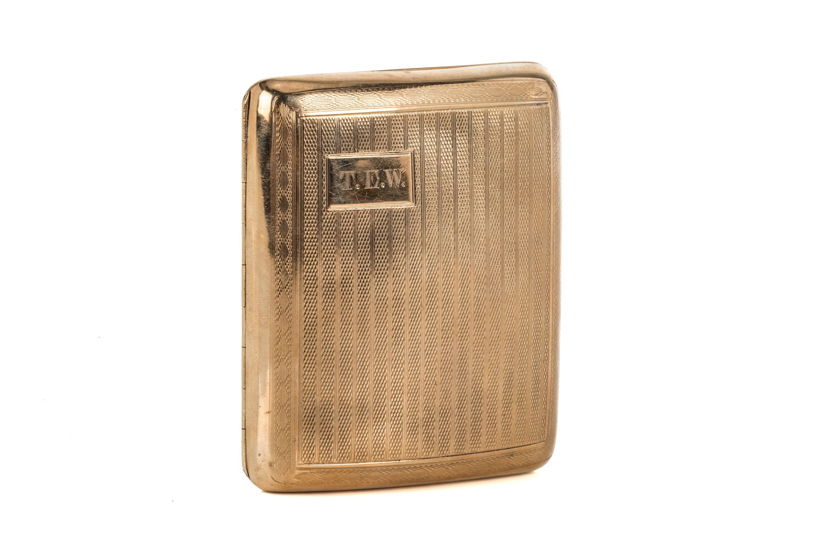 9K YELLOW GOLD BRITISH CIGARETTE CASE 76.1g: Monogrammed 'T.E.W.', date stamped 1926, marked 9k and 375, Birmingham, to inside of case. Measuring 3.25 inches by 2.5 inches, with push button release. Interior engraved with a commemoration from Th