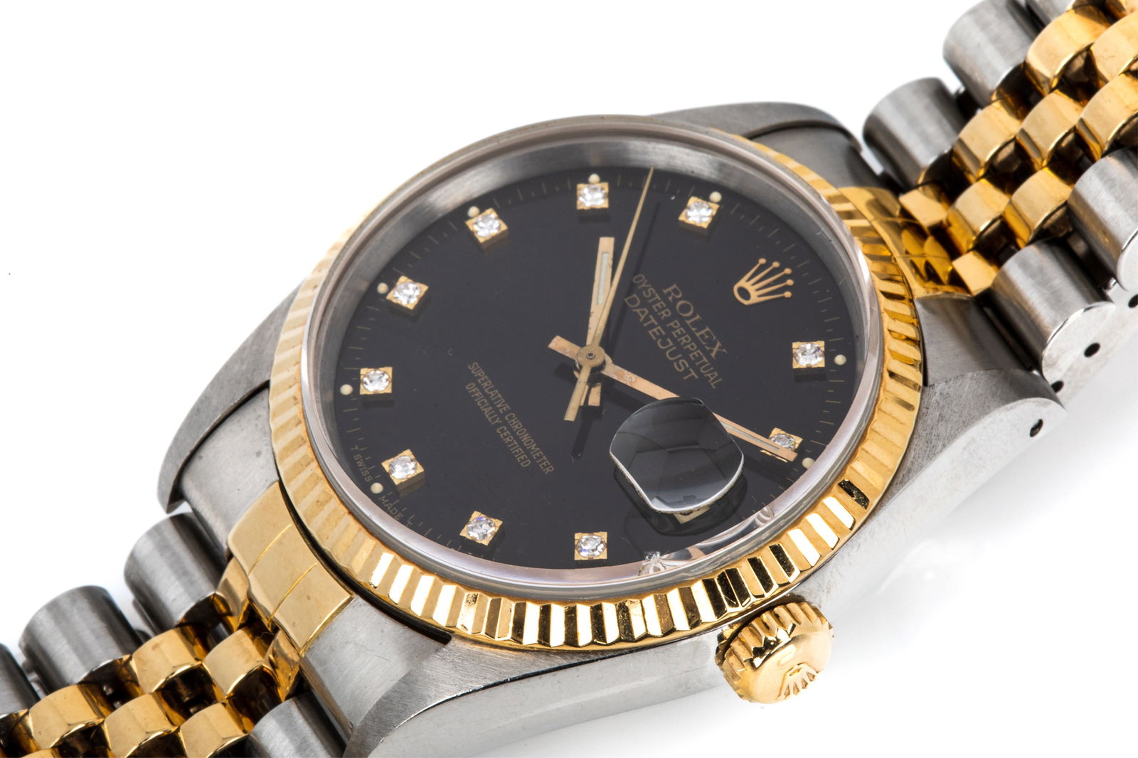ROLEX DATEJUST 36 16233 BLACK DIA. 2-TONE JUBILEE: Stainless steel and 18K yellow gold Rolex Datejust 36 wristwatch, black gloss dial with factory diamond markers, model 16233, serial number EB6****. Case features synthetic sapphire crystal with cyclo