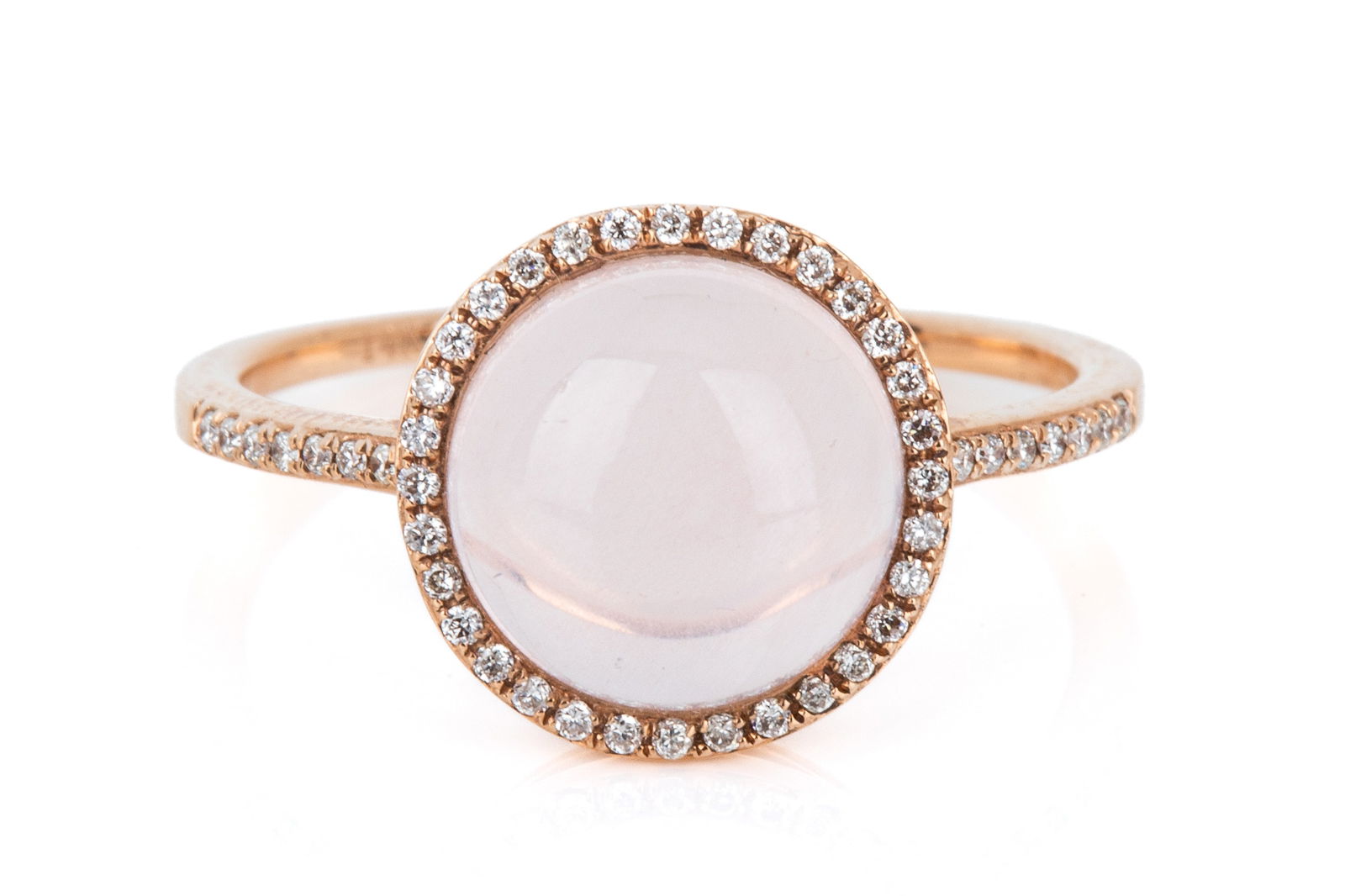 14K ROSE QUARTZ & DIAMOND HALO RING 2.5g: 14K rose gold halo ring measuring 11.3mm wide by 6.5mm tall. Featuring round cabochon cut rose quartz measuring approximately 9.2mm in diameter. Accented by petite round brilliant cut diamonds equalin