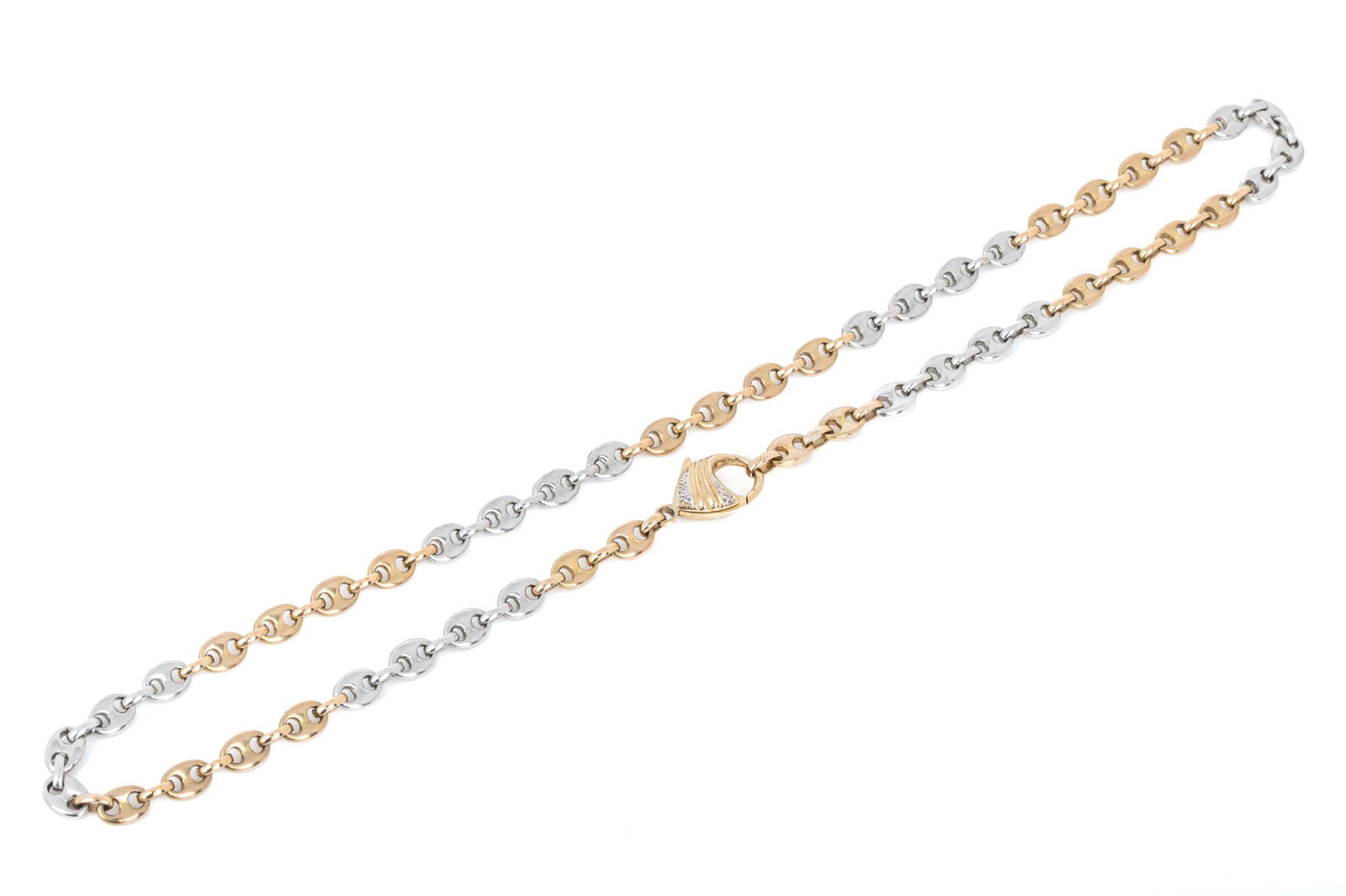 14K & 8K GUCCI LINK TWO TONE CHAIN 30g: 8K yellow and white gold Gucci link necklace with oversized diamond accented 14K yellow gold lobster clasp, measuring 20 inches long by 5.7mm wide, clasp measuring 19.8mm by 12.3mm x 5.3mm. Featuring