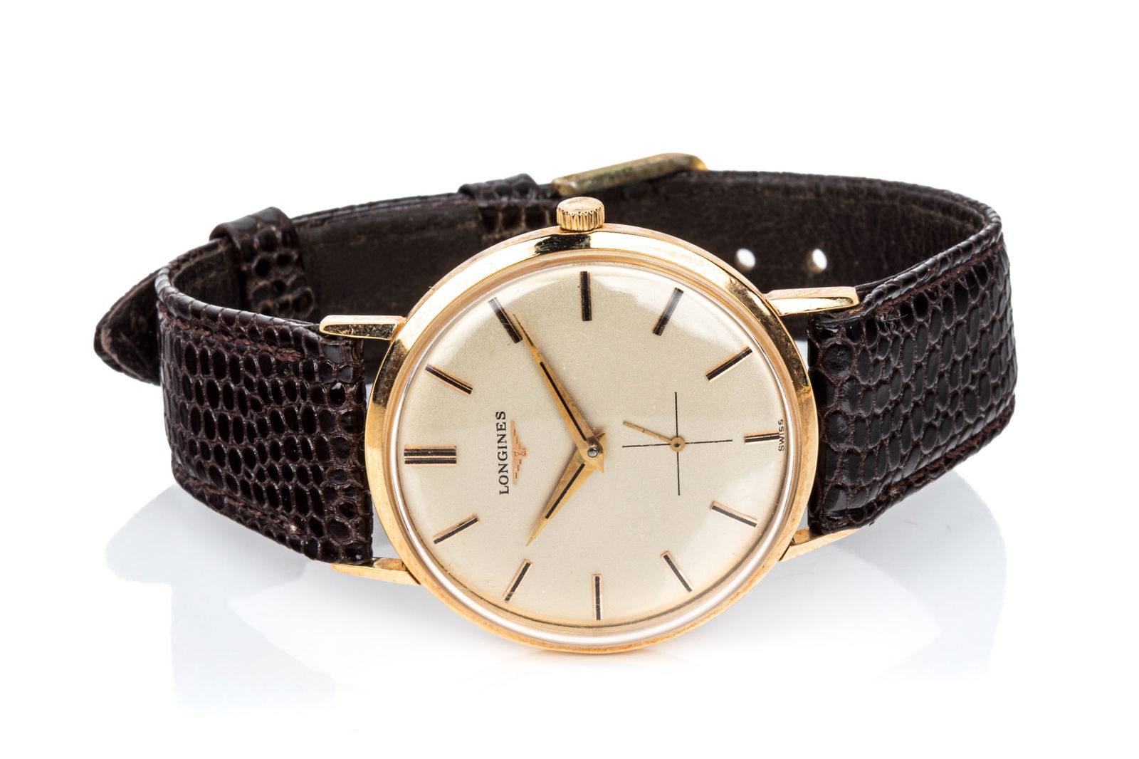 18K GOLD LONGINES MECH. WATCH, STRAP 28.9g: 18K yellow gold Longines Swiss made mechanical watch numbered 7744 5, 15 574214, 33mm case with original signed crystal, Swiss hallmarked case and case back, plastic crystal, brown leather strap (bare