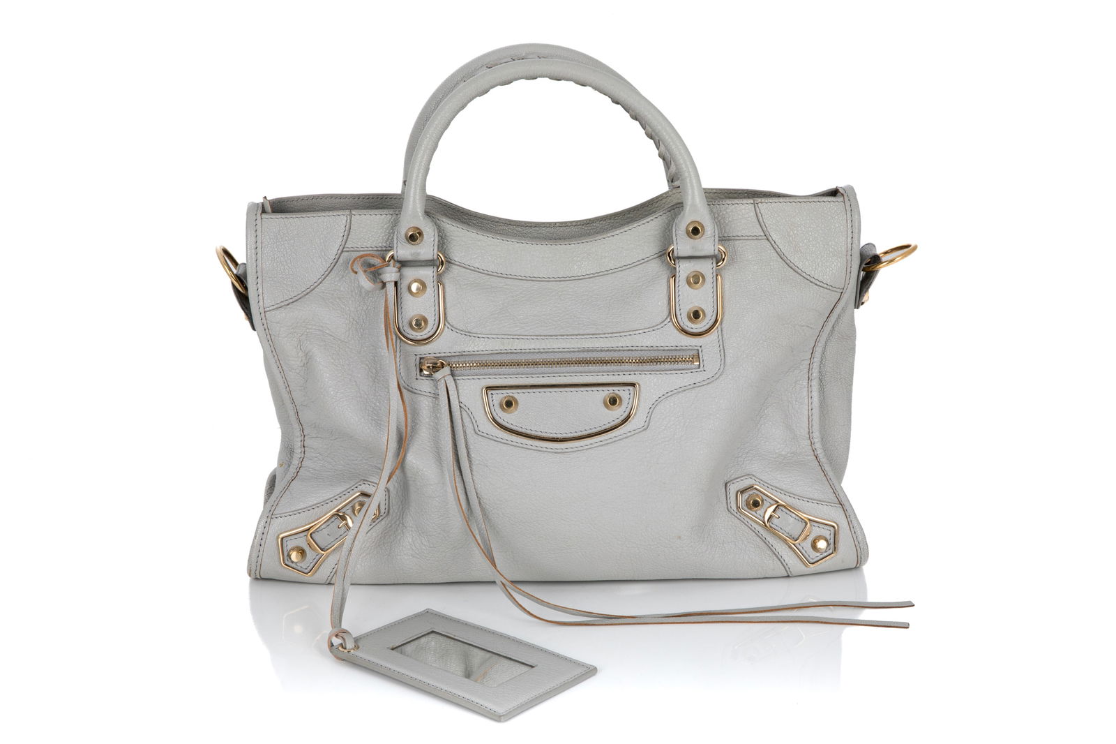 BALENCIAGA LE CITY BAG MEDIUM GRIS CLAIR: Balenciaga Le City Bag Medium Chevre Gold Metallic Edge Hardware Gris Clair, made in Italy. Including original dust bag, detachable shoulder strap, and a removable mirror. Serial number embossed on th