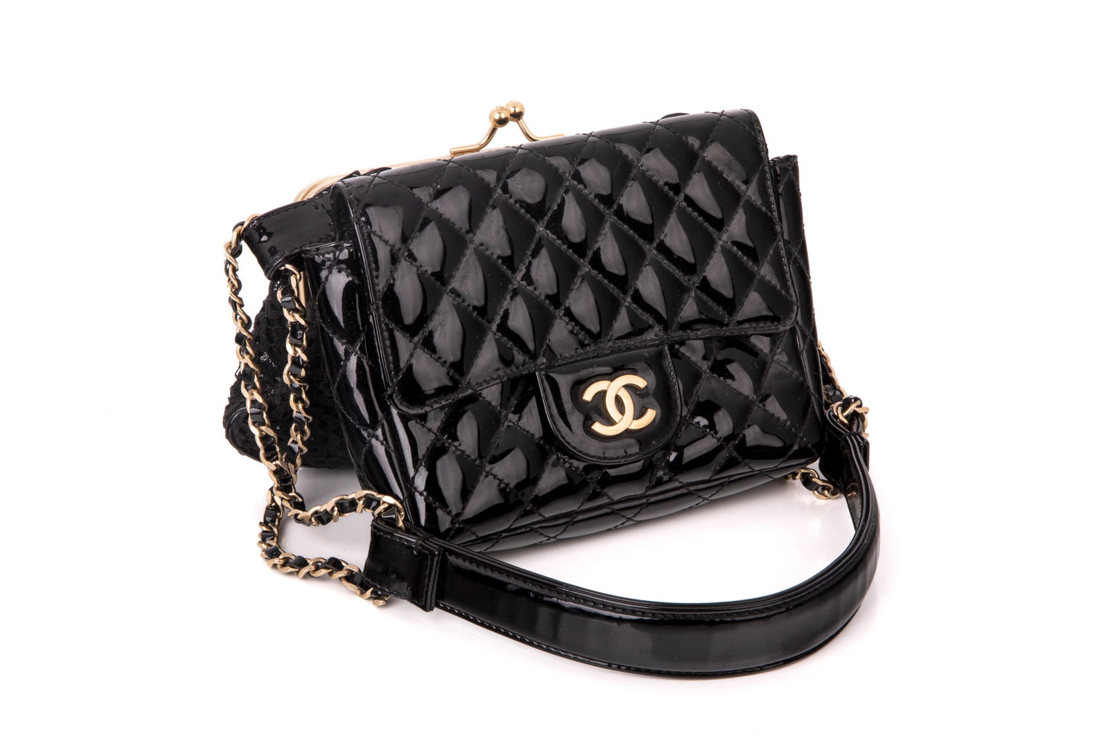 CHANEL TWIN CHAIN BAG: Chanel win Chain Evening Bag Gold Hardware, 2009-2010 Including a quilted leather clutch and a crochet pouch connected by a woven chain shoulder strap. Does not include original dust bag, box, authent